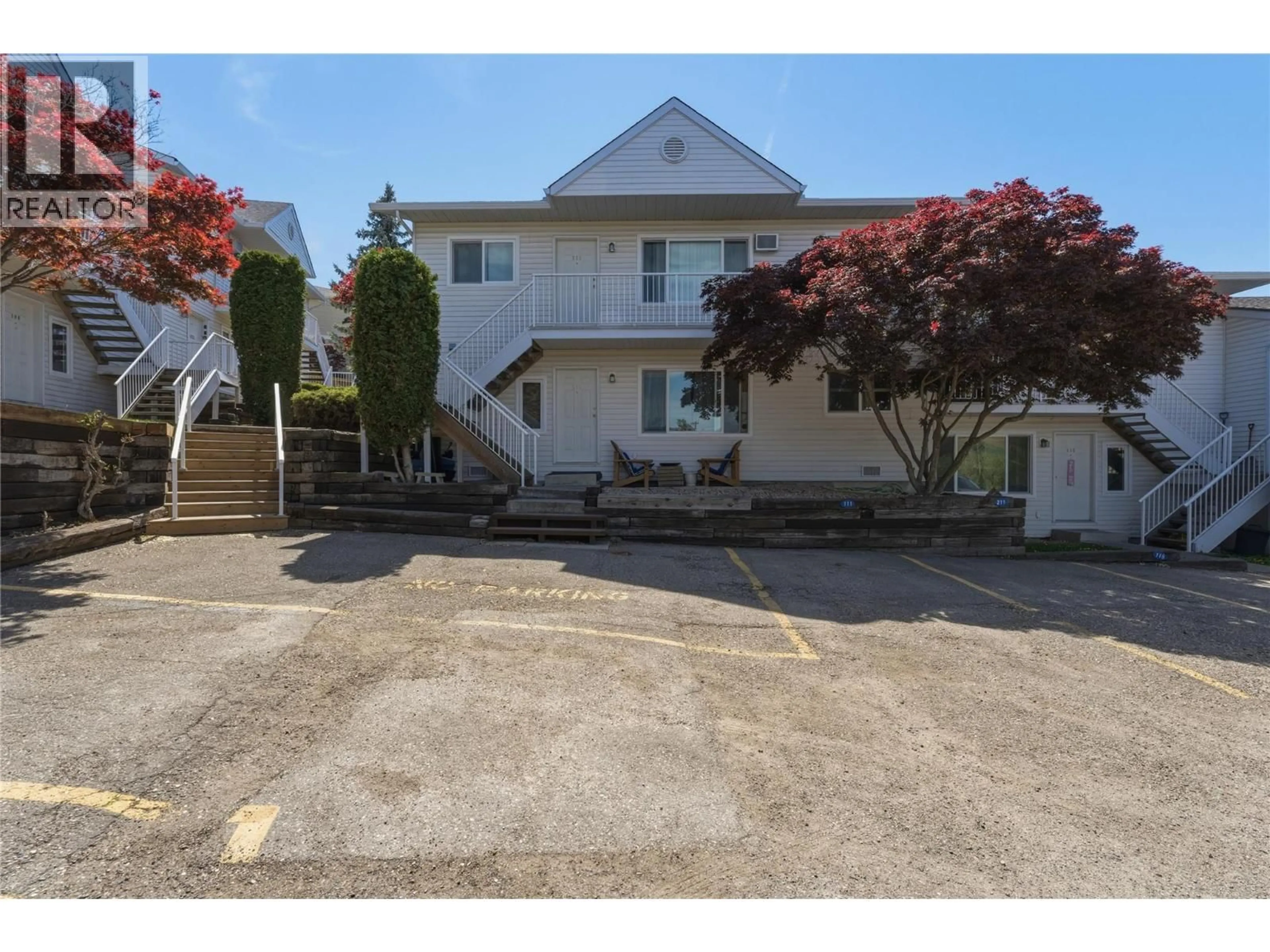 A pic from outside/outdoor area/front of a property/back of a property/a pic from drone, street for 211 - 4305 BELLEVUE DRIVE, Vernon British Columbia V1T9J2