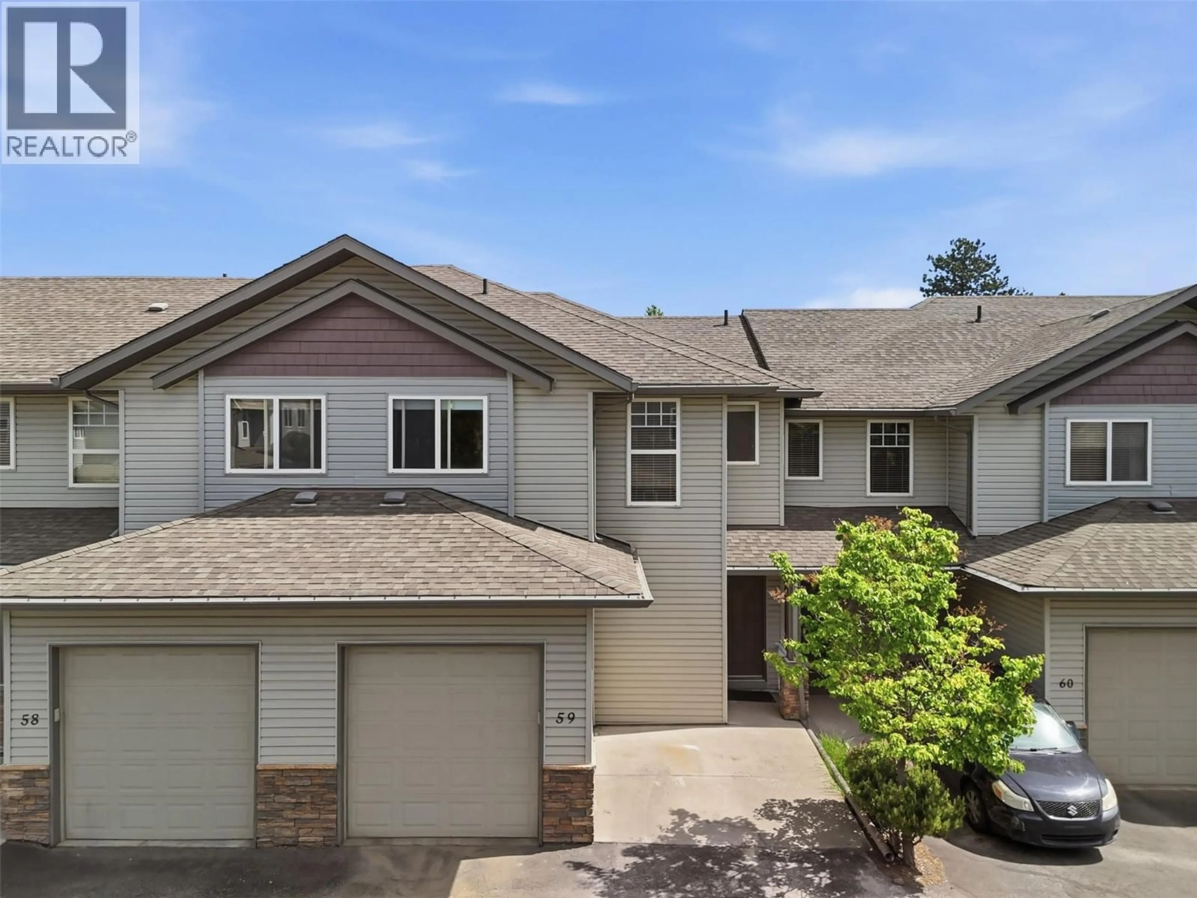 A pic from outside/outdoor area/front of a property/back of a property/a pic from drone, street for 59 - 2046 ROBSON PLACE, Kamloops British Columbia V2E0A5