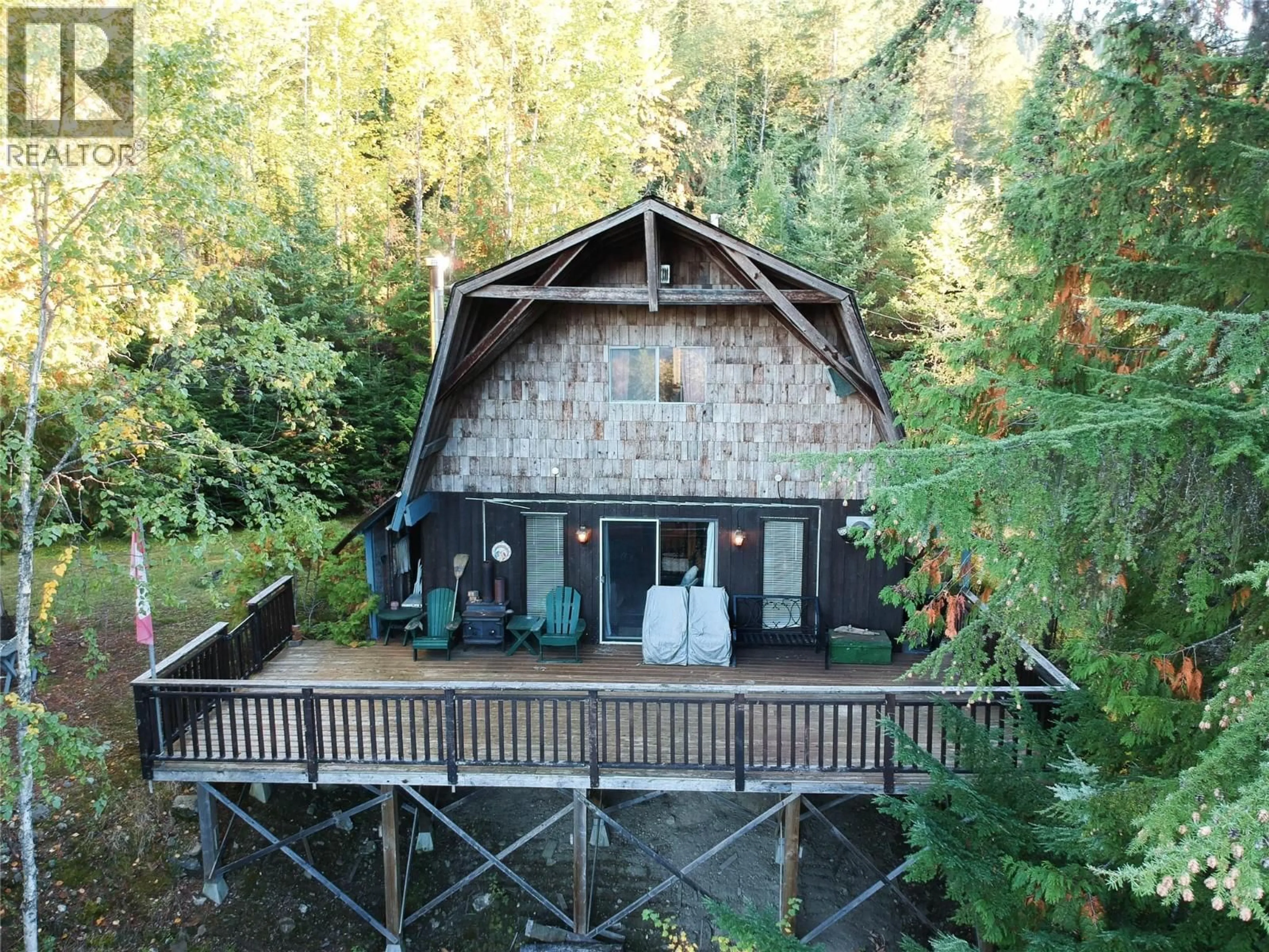 A pic from outside/outdoor area/front of a property/back of a property/a pic from drone, water/lake/river/ocean view for 3217 LUMBY MABEL LAKE ROAD, Lumby British Columbia V0E2G6