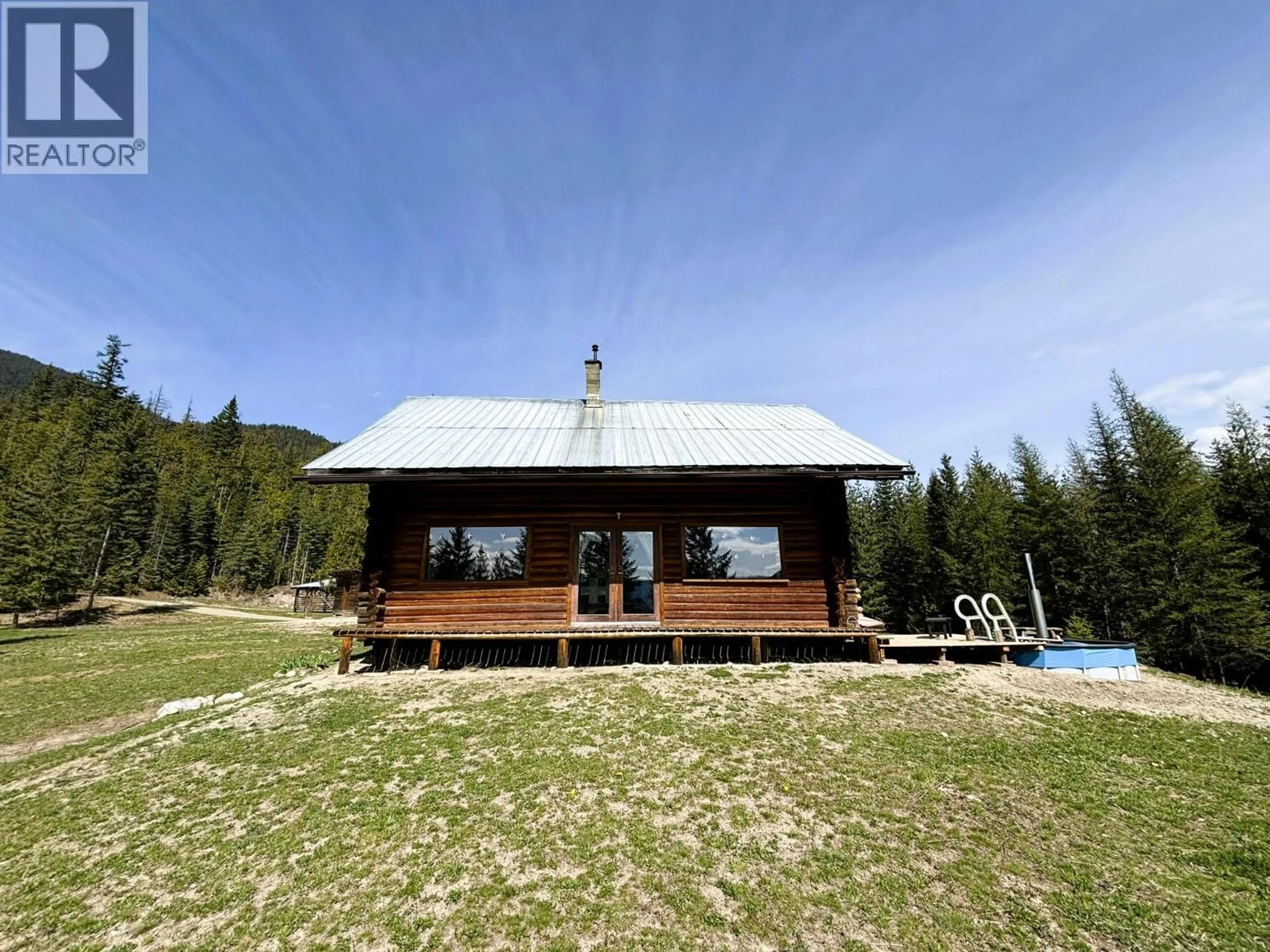 A pic from outside/outdoor area/front of a property/back of a property/a pic from drone, building for 1425 BOBBIE BURNS ROAD, Lumby British Columbia V0E2C4