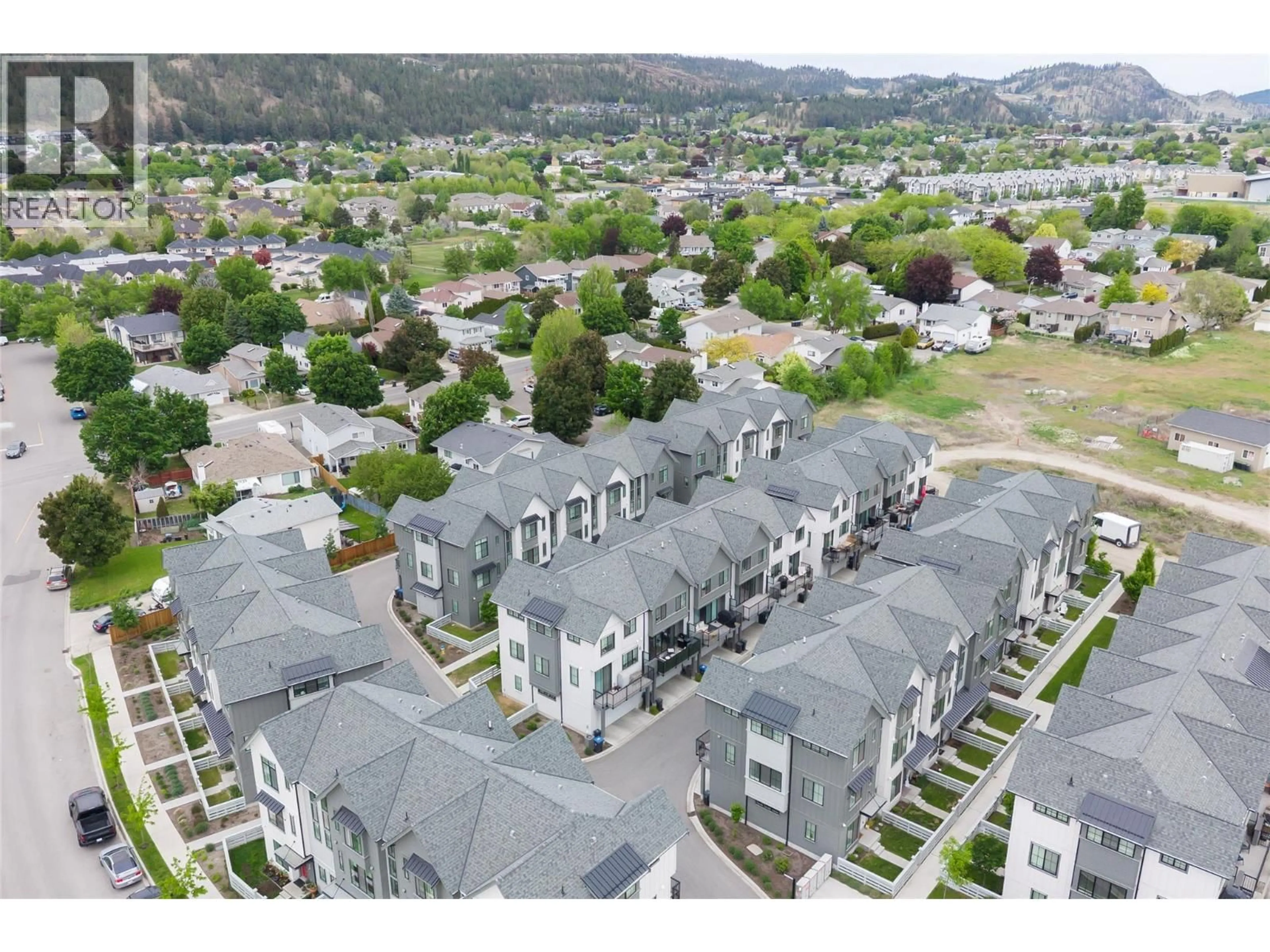 A pic from outside/outdoor area/front of a property/back of a property/a pic from drone, mountain view for 32 - 307 GLEN PARK DRIVE, Kelowna British Columbia V1V0H1