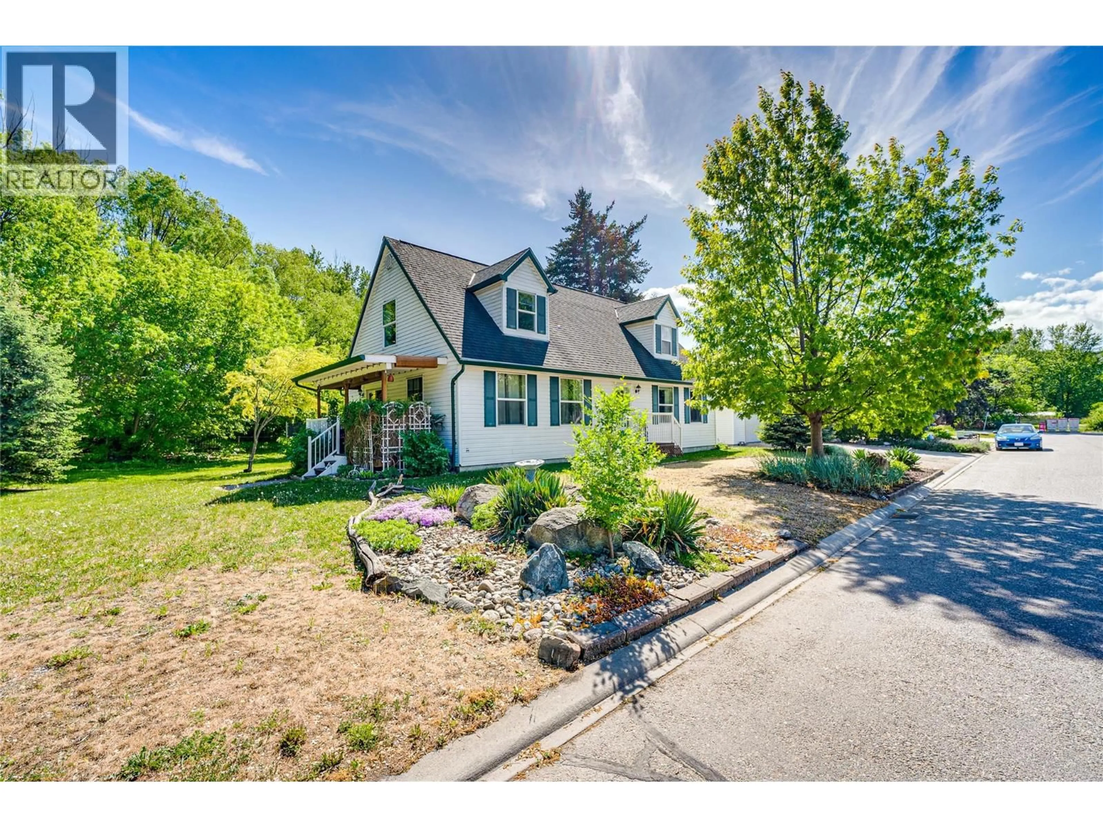 A pic from outside/outdoor area/front of a property/back of a property/a pic from drone, street for 1902 50 AVENUE, Vernon British Columbia V1T4E8