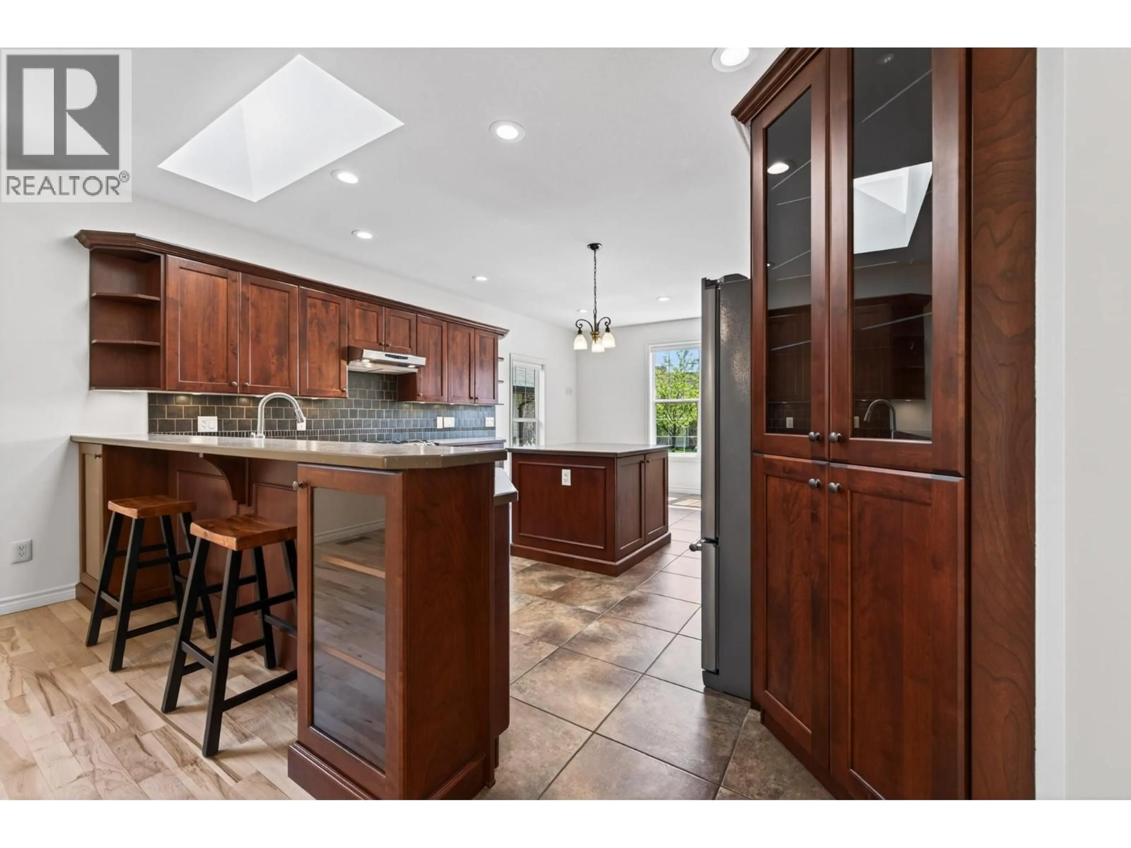 Open concept kitchen, ceramic/tile floor for 606 STONERIDGE LANE, Kamloops British Columbia V2H0A7