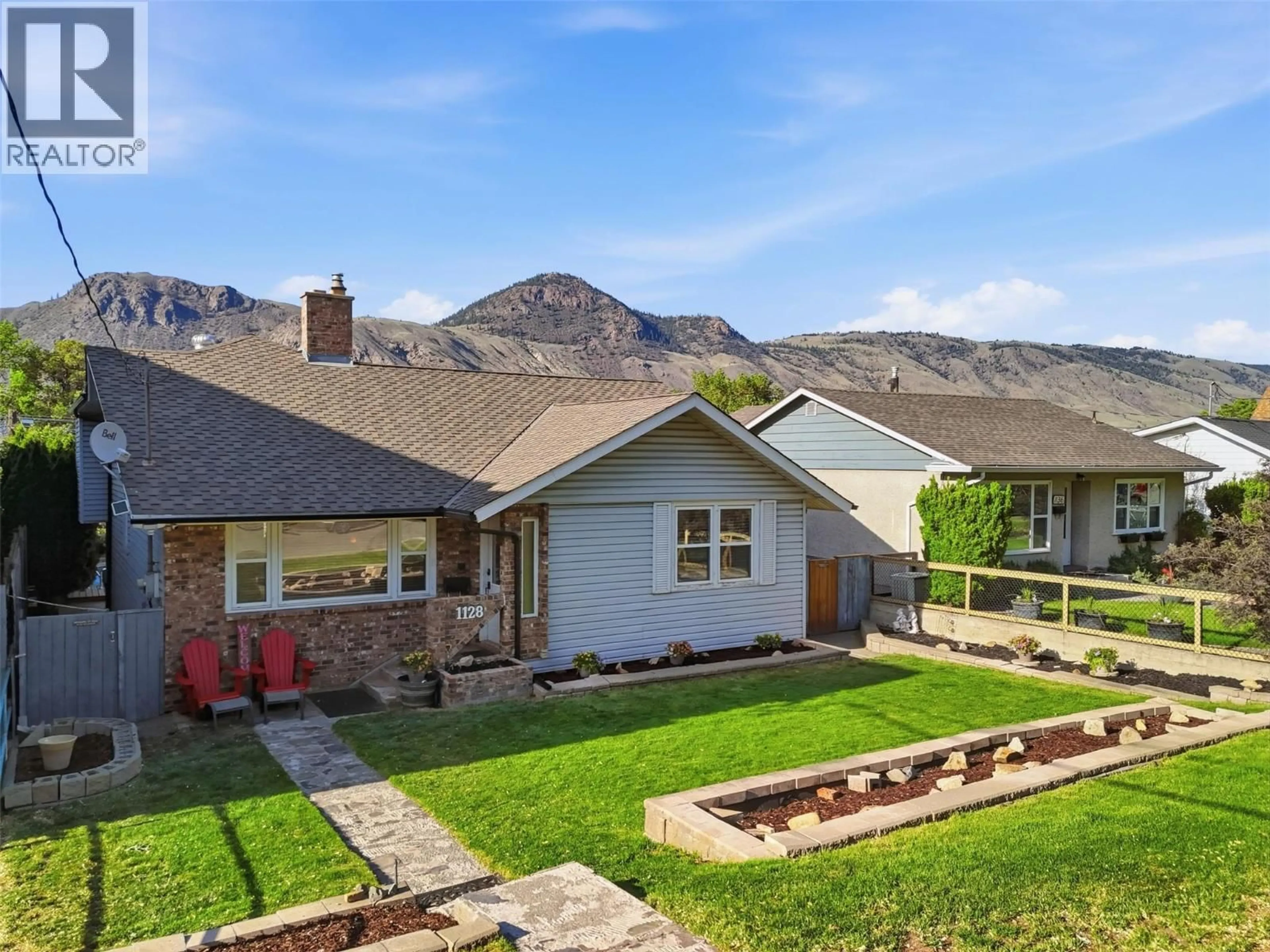 A pic from outside/outdoor area/front of a property/back of a property/a pic from drone, mountain view for 1128 NICOLA STREET, Kamloops British Columbia V2C2S3