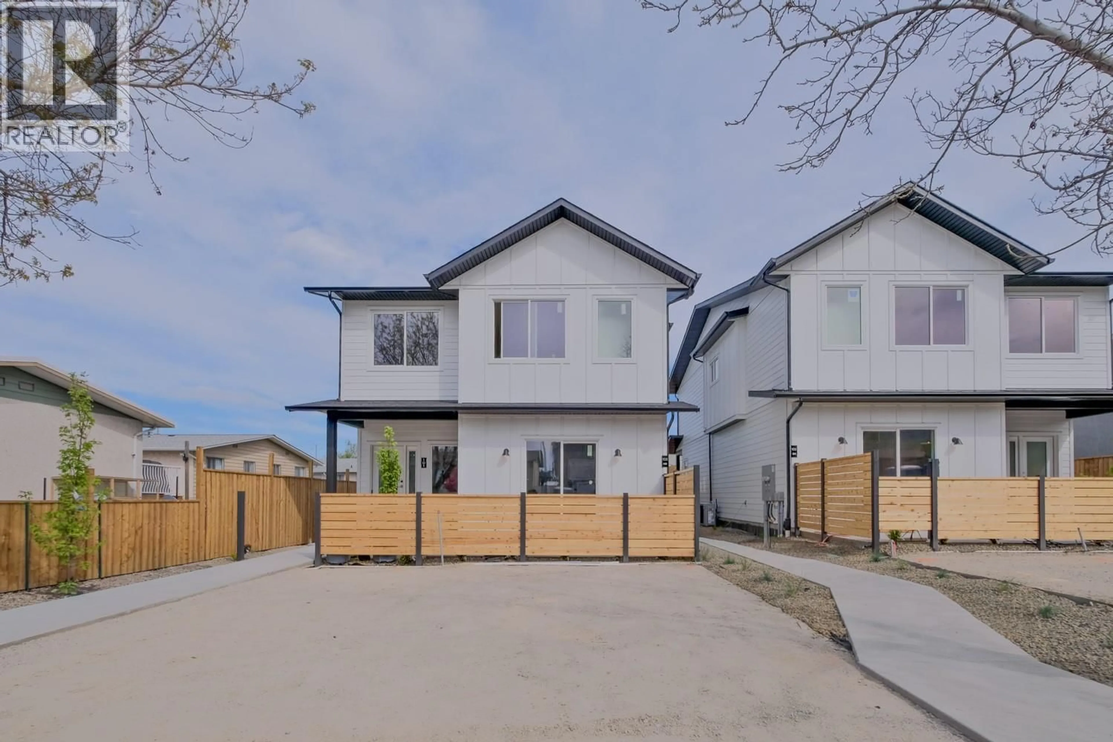 A pic from outside/outdoor area/front of a property/back of a property/a pic from drone, street for 101 - 179 KIRKPATRICK AVENUE, Penticton British Columbia V2A3P4