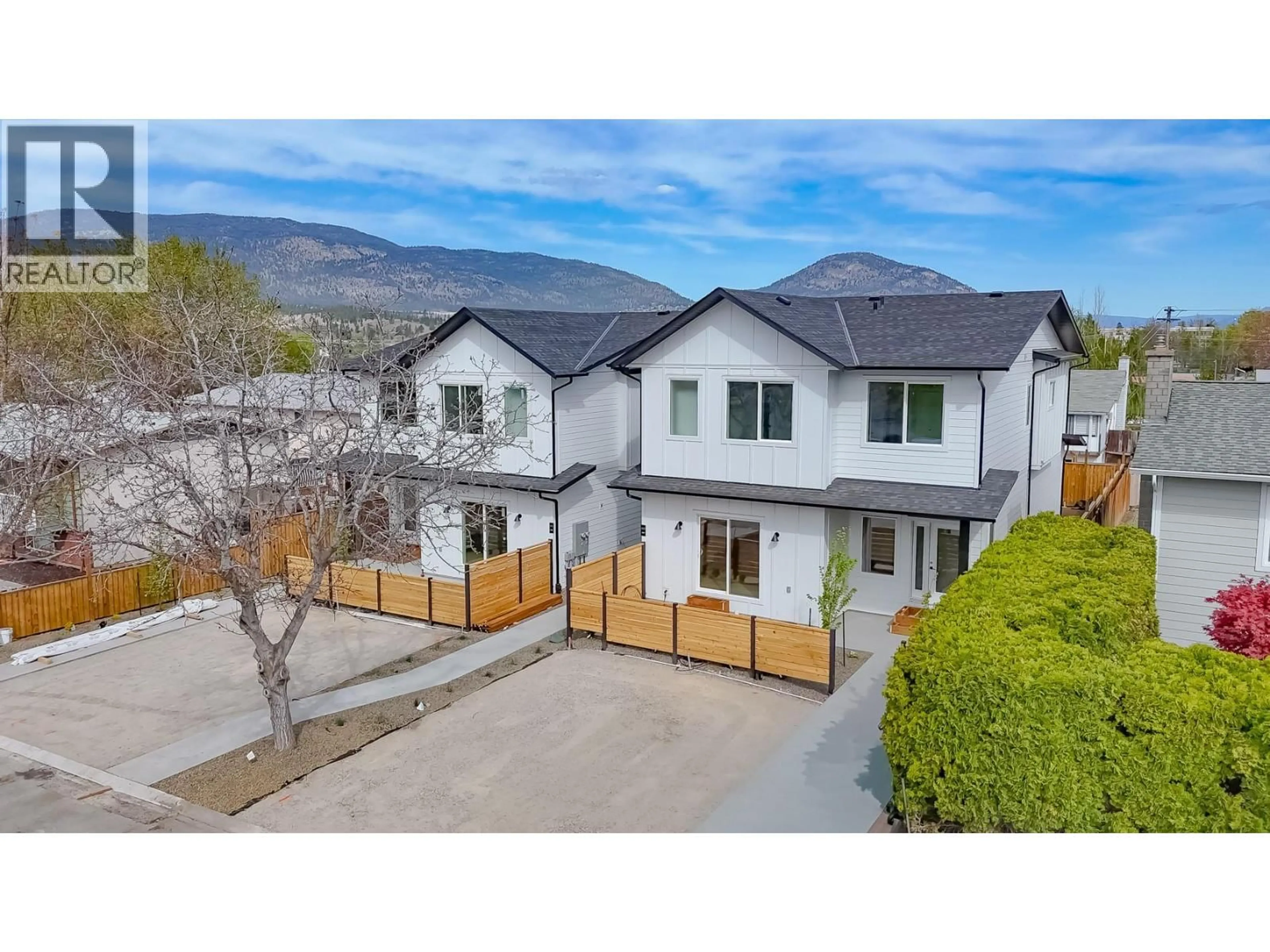 A pic from outside/outdoor area/front of a property/back of a property/a pic from drone, mountain view for 101 - 179 KIRKPATRICK AVENUE, Penticton British Columbia V2A3P4