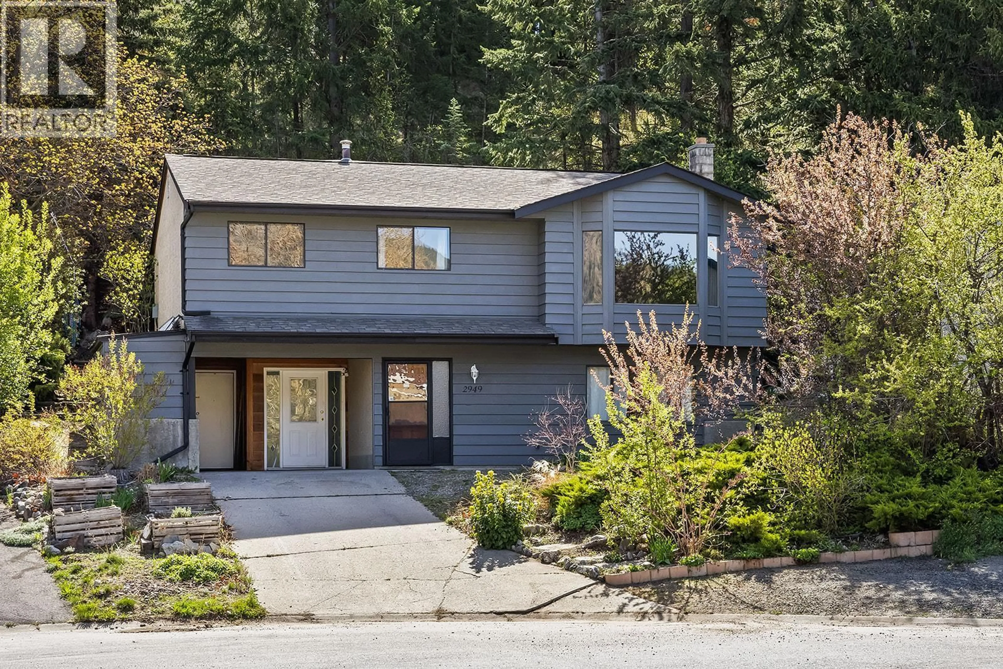 Home with vinyl exterior material, street for 2949 SANDSTONE CRESCENT, West Kelowna British Columbia V0H2A0