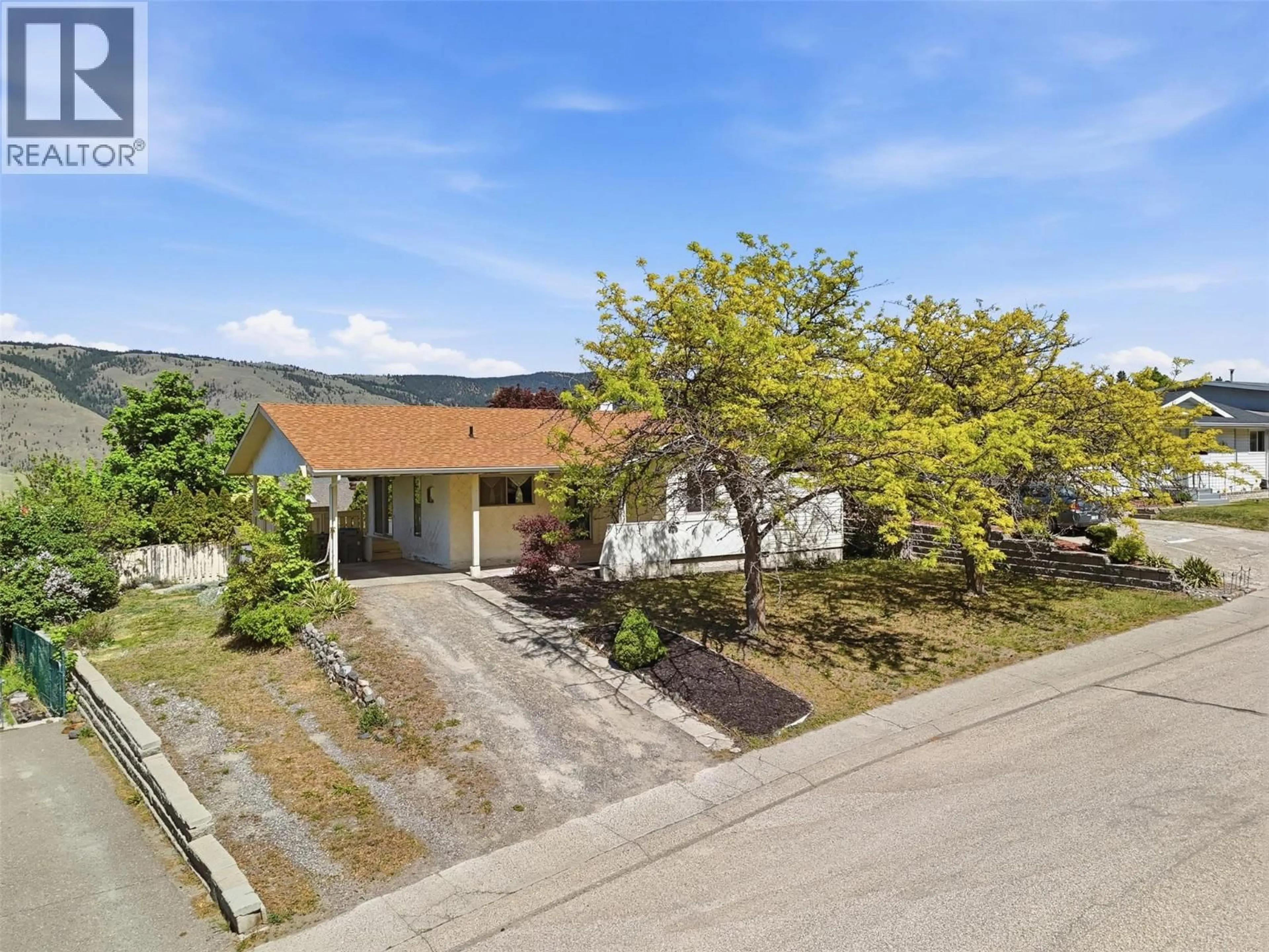 A pic from outside/outdoor area/front of a property/back of a property/a pic from drone, street for 2444 NECHAKO DRIVE, Kamloops British Columbia V2E1S7