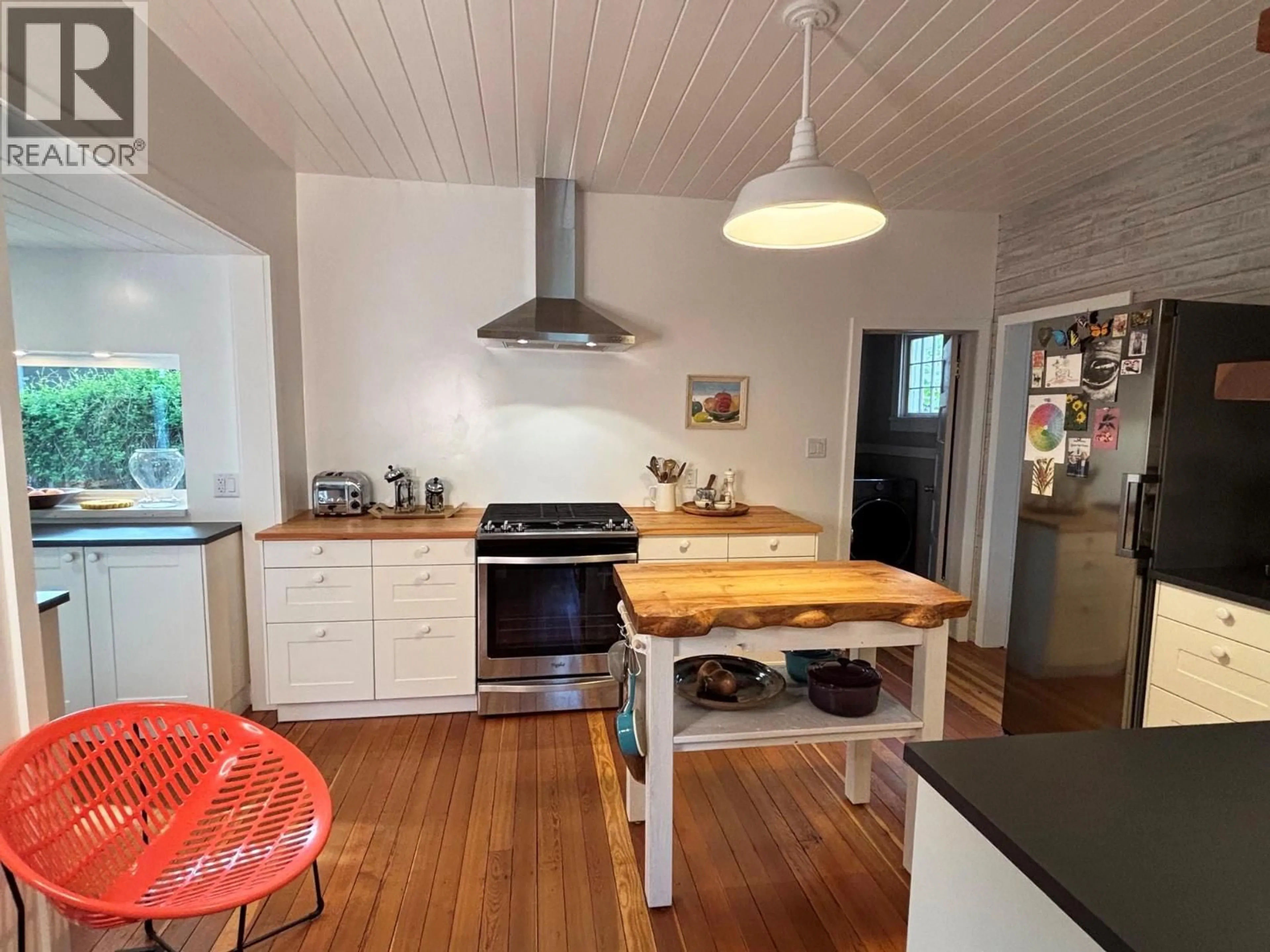 Open concept kitchen, wood/laminate floor for 7489 9TH STREET, Grand Forks British Columbia V0H1H0
