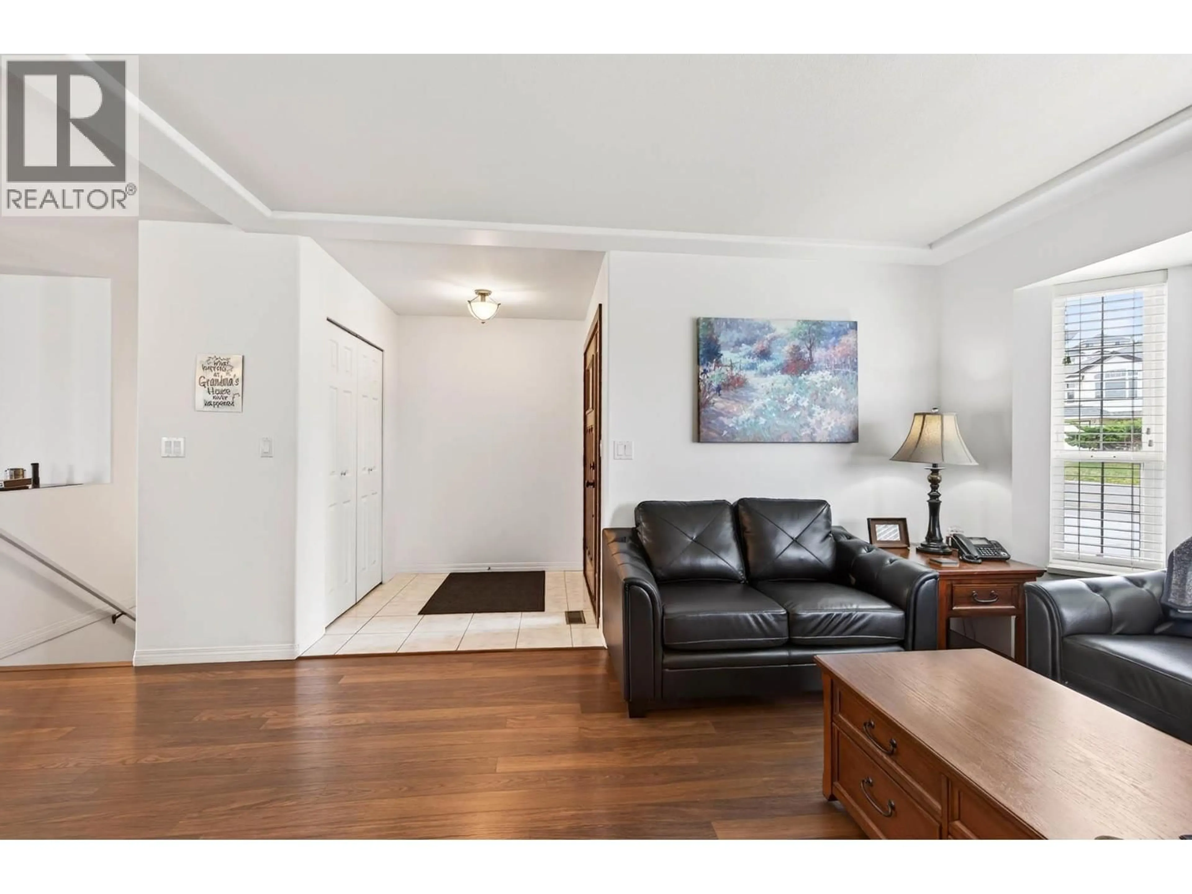 Living room with furniture, wood/laminate floor for 2359 WHITBURN CRESCENT, Kamloops British Columbia V1S1W4