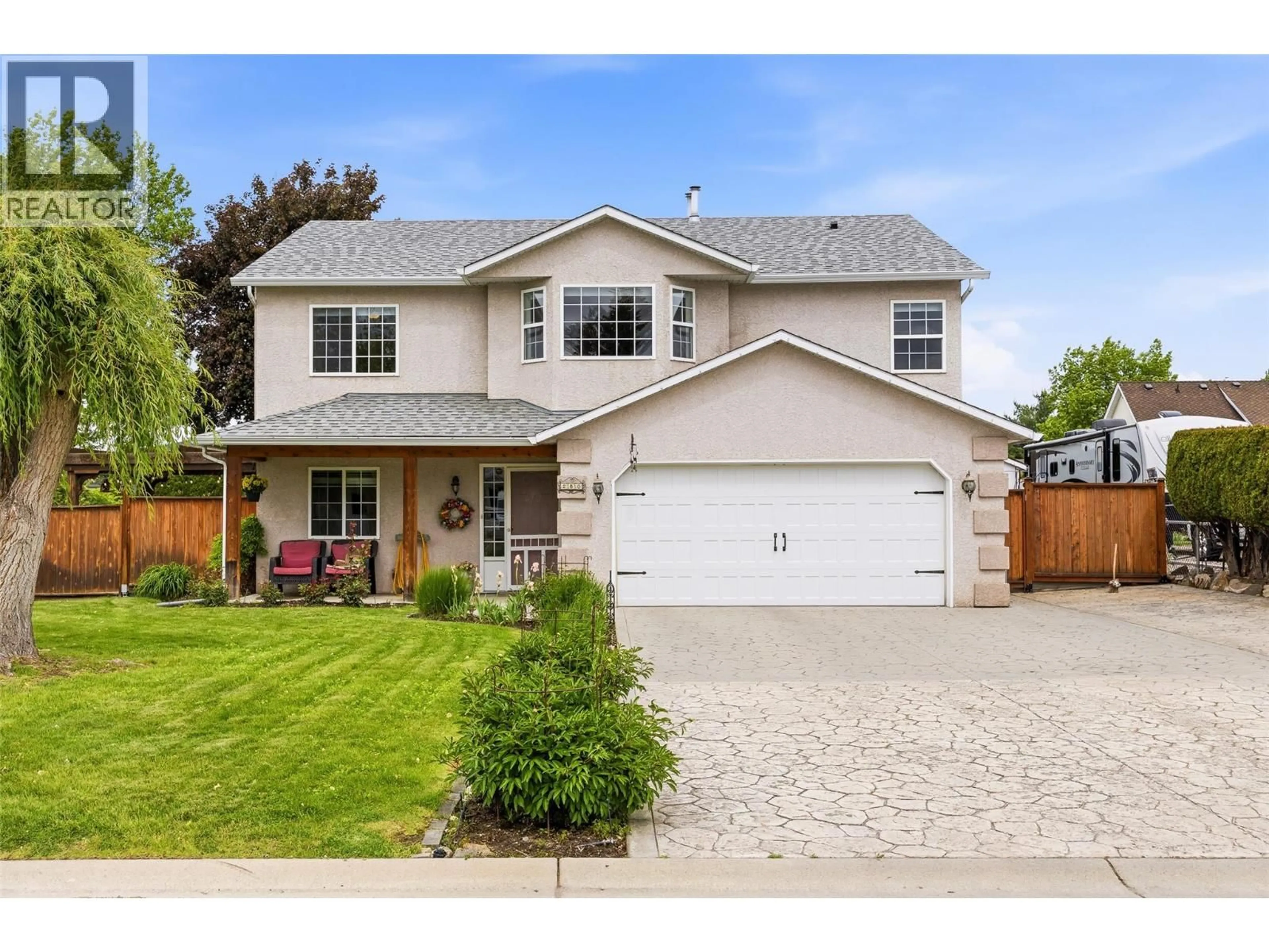 Home with vinyl exterior material, street for 250 FELIX ROAD, Kelowna British Columbia V1X7C9