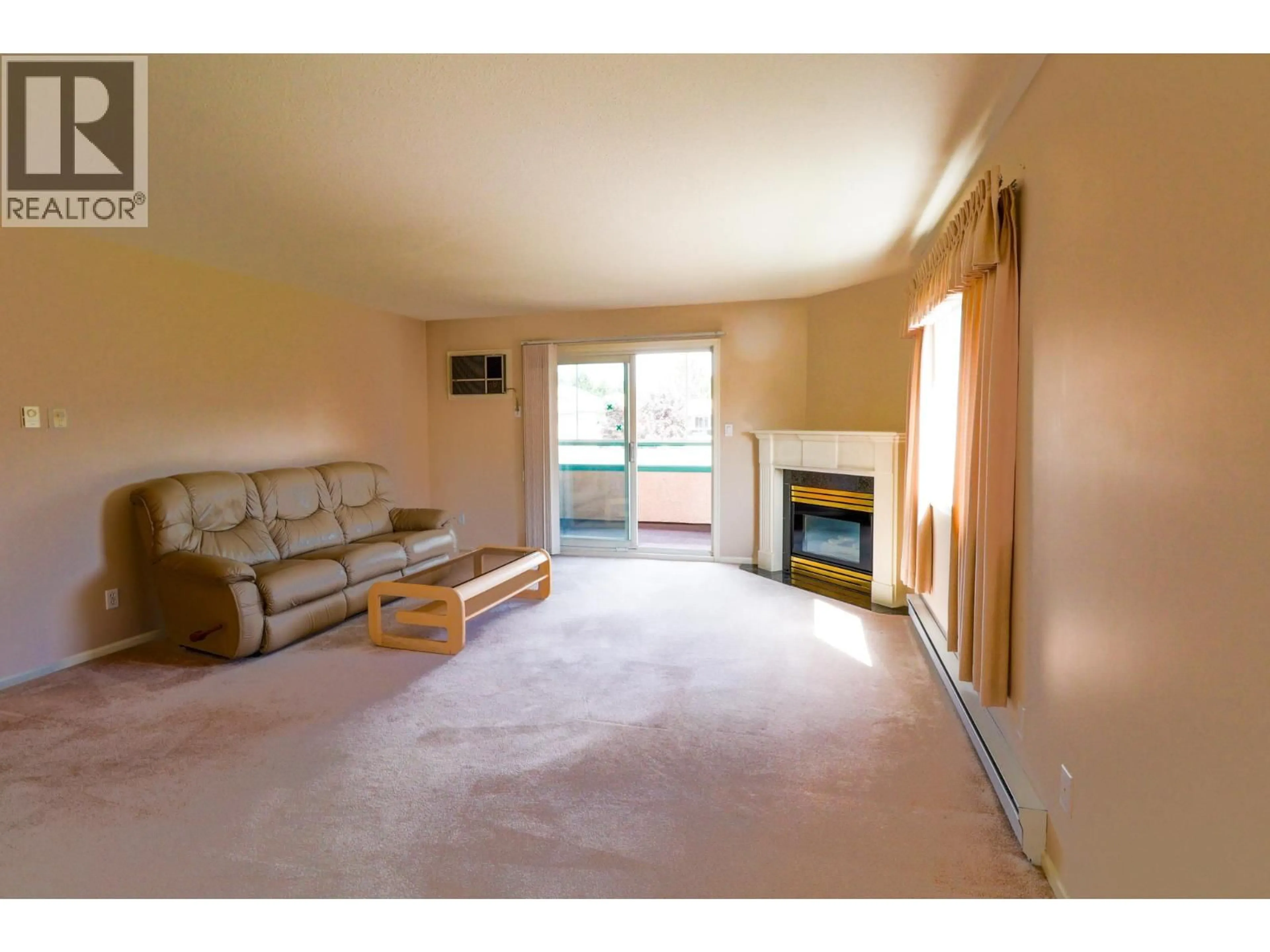 Living room with furniture, unknown for 208 - 8907 PINEO COURT, Summerland British Columbia V0H1Z5