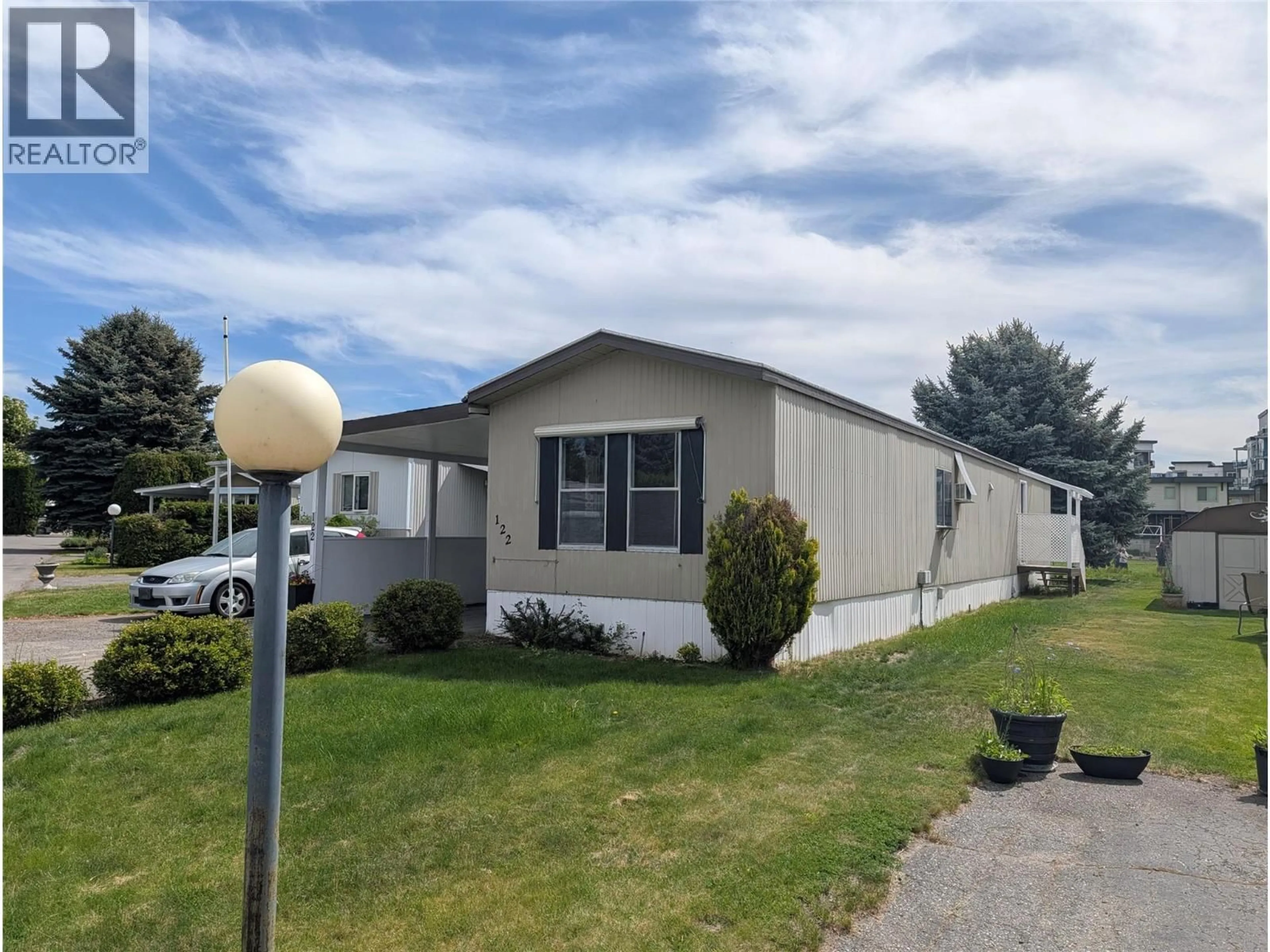 Home with vinyl exterior material, street for 122 - 3535 CASORSO ROAD, Kelowna British Columbia V1W3E1