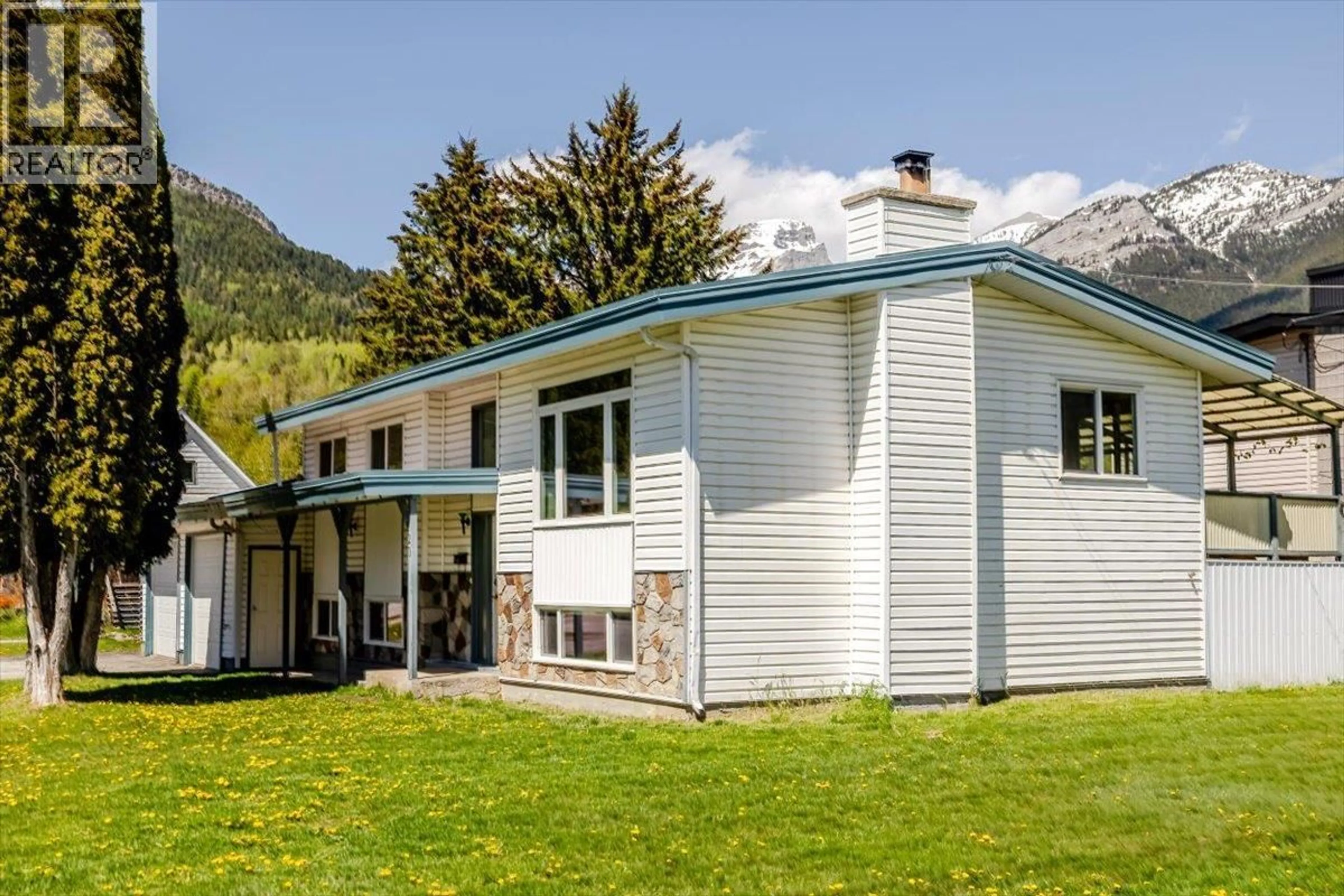 Home with vinyl exterior material, mountain view for 1201 10TH AVENUE, Fernie British Columbia V0B1M0