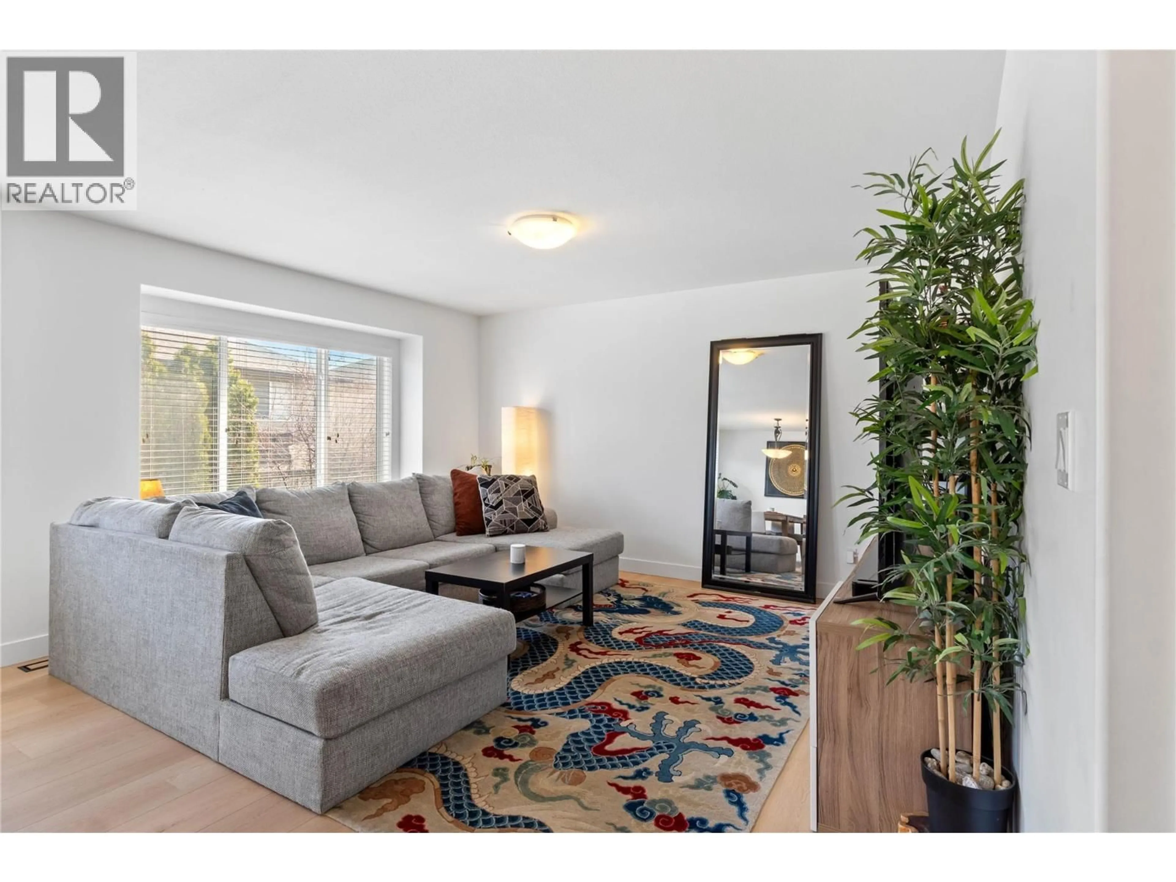 Living room with furniture, wood/laminate floor for 16 - 1760 COPPERHEAD DRIVE, Kamloops British Columbia V1S2B4