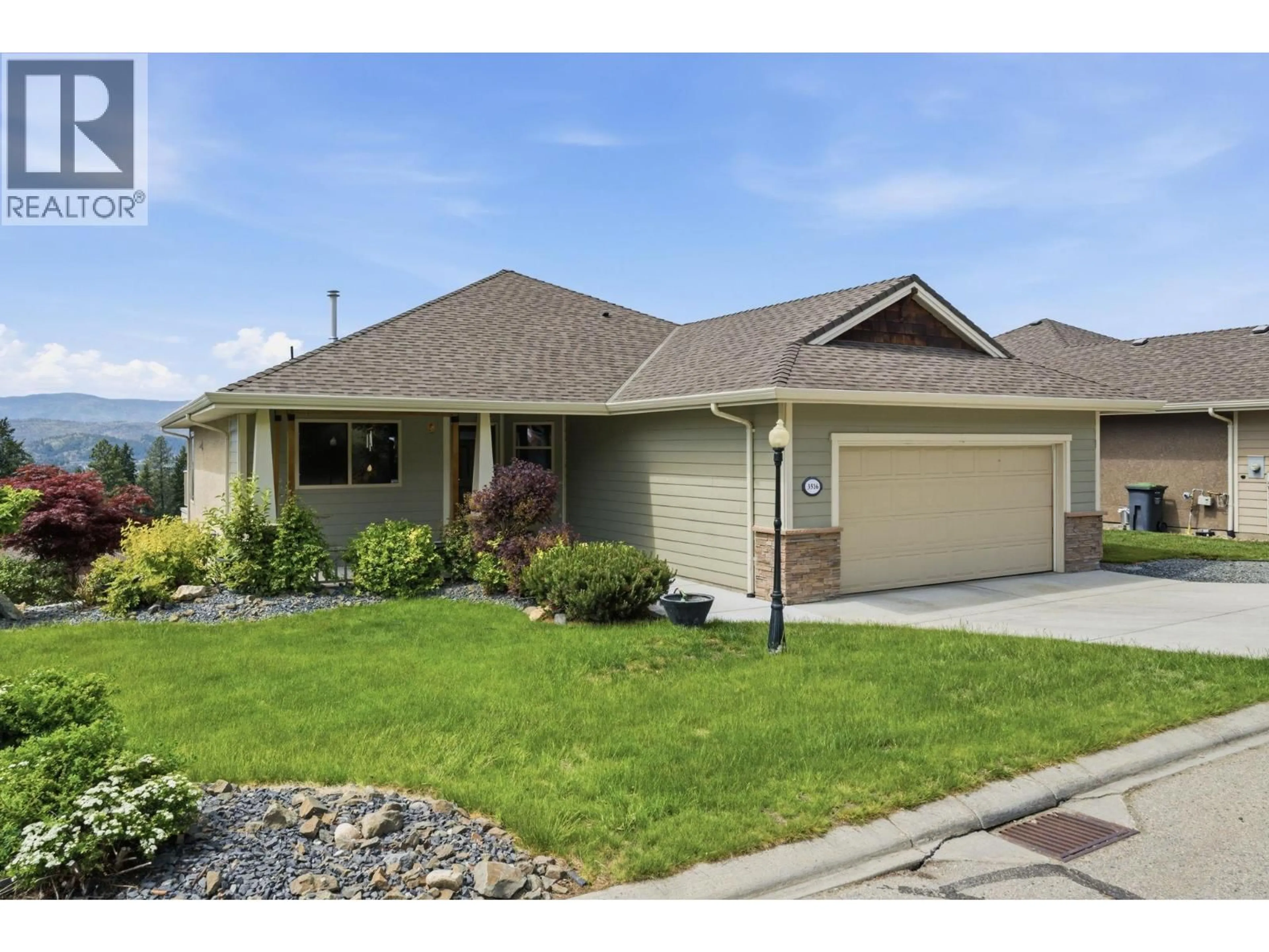 Home with vinyl exterior material, street for 3516 CAMELBACK DRIVE, Kelowna British Columbia V1X8A7