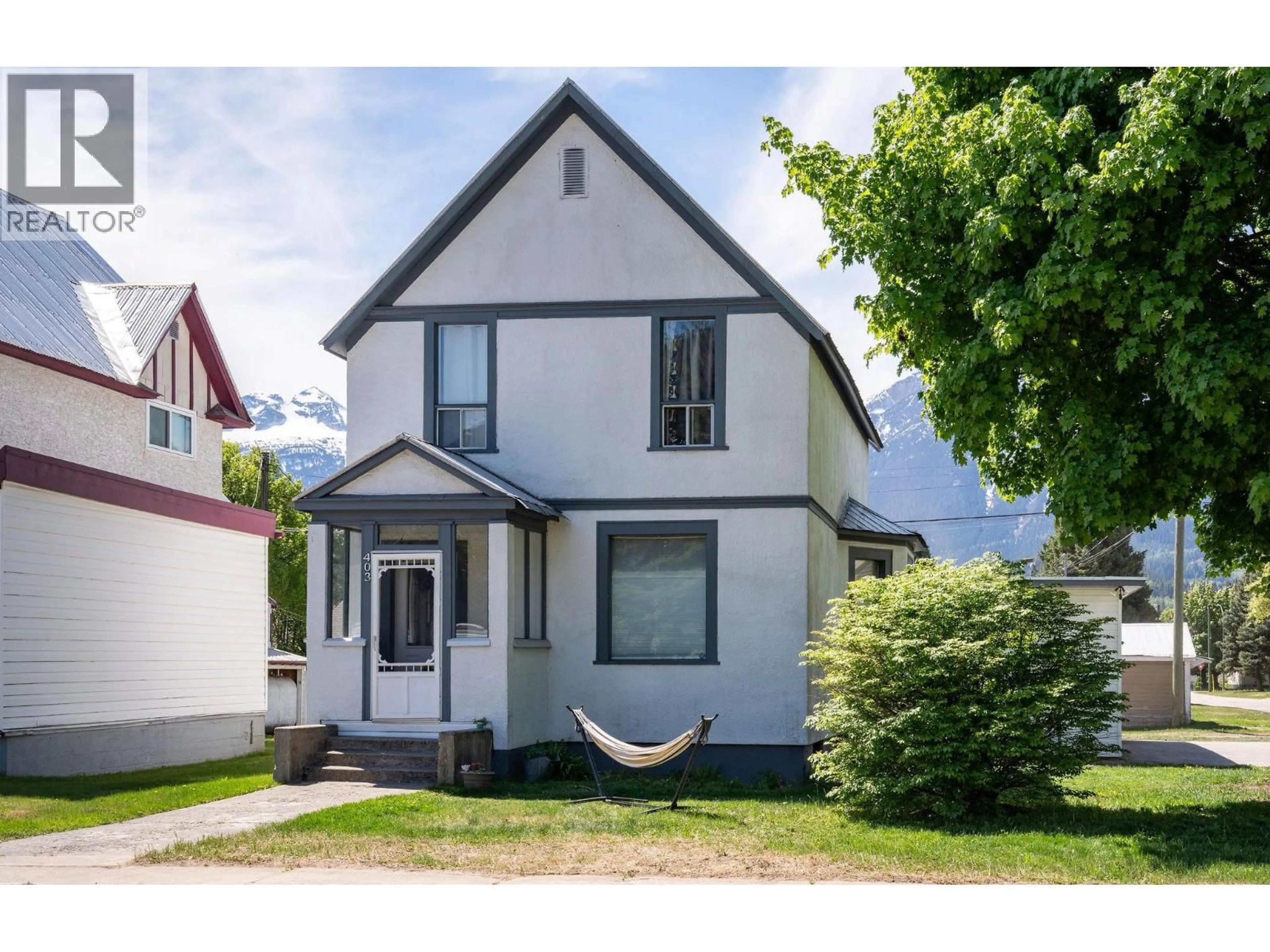 Home with vinyl exterior material, street for 403 FIFTH STREET EAST, Revelstoke British Columbia V0E2S0