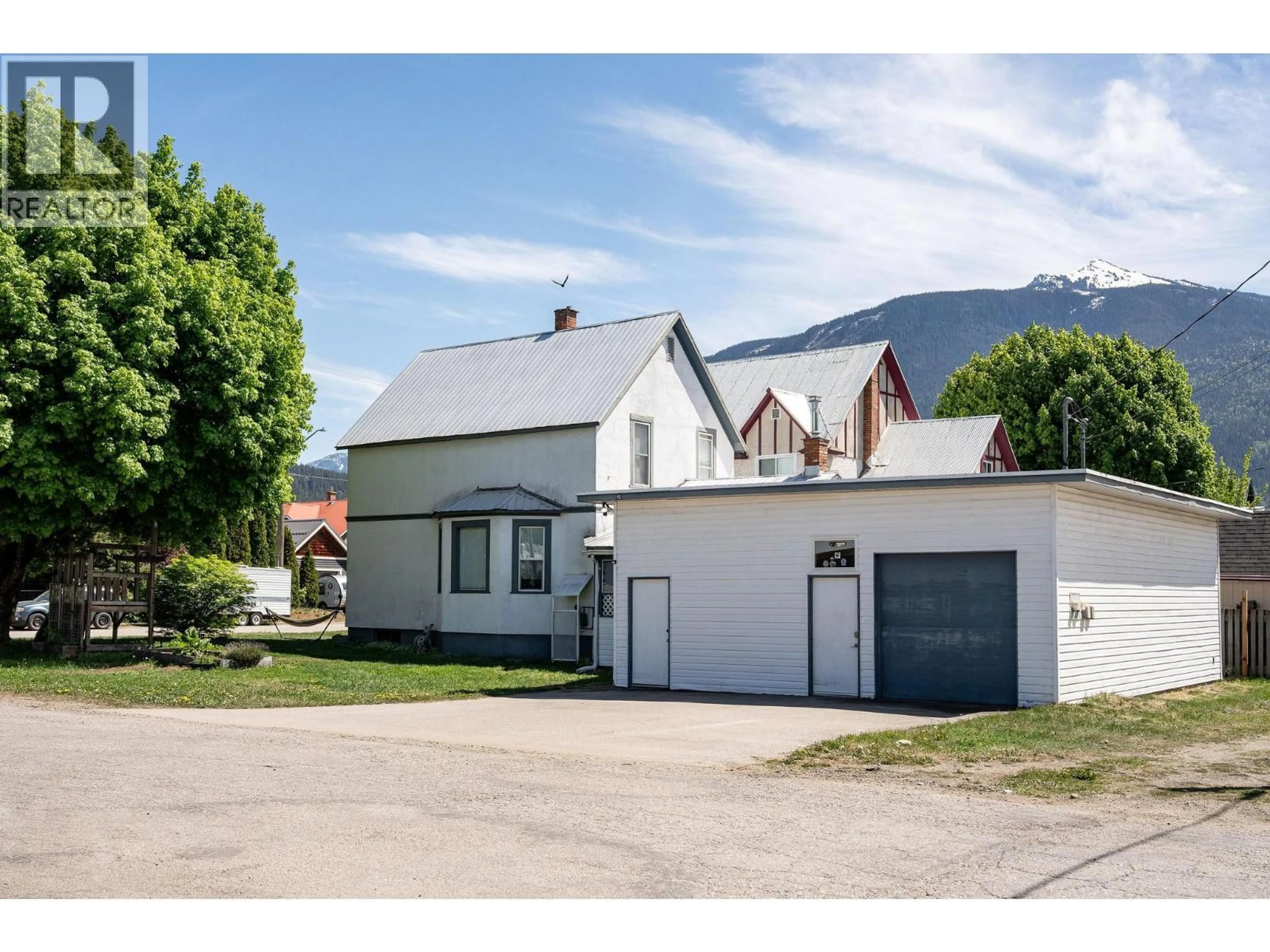 A pic from outside/outdoor area/front of a property/back of a property/a pic from drone, street for 403 FIFTH STREET EAST, Revelstoke British Columbia V0E2S0