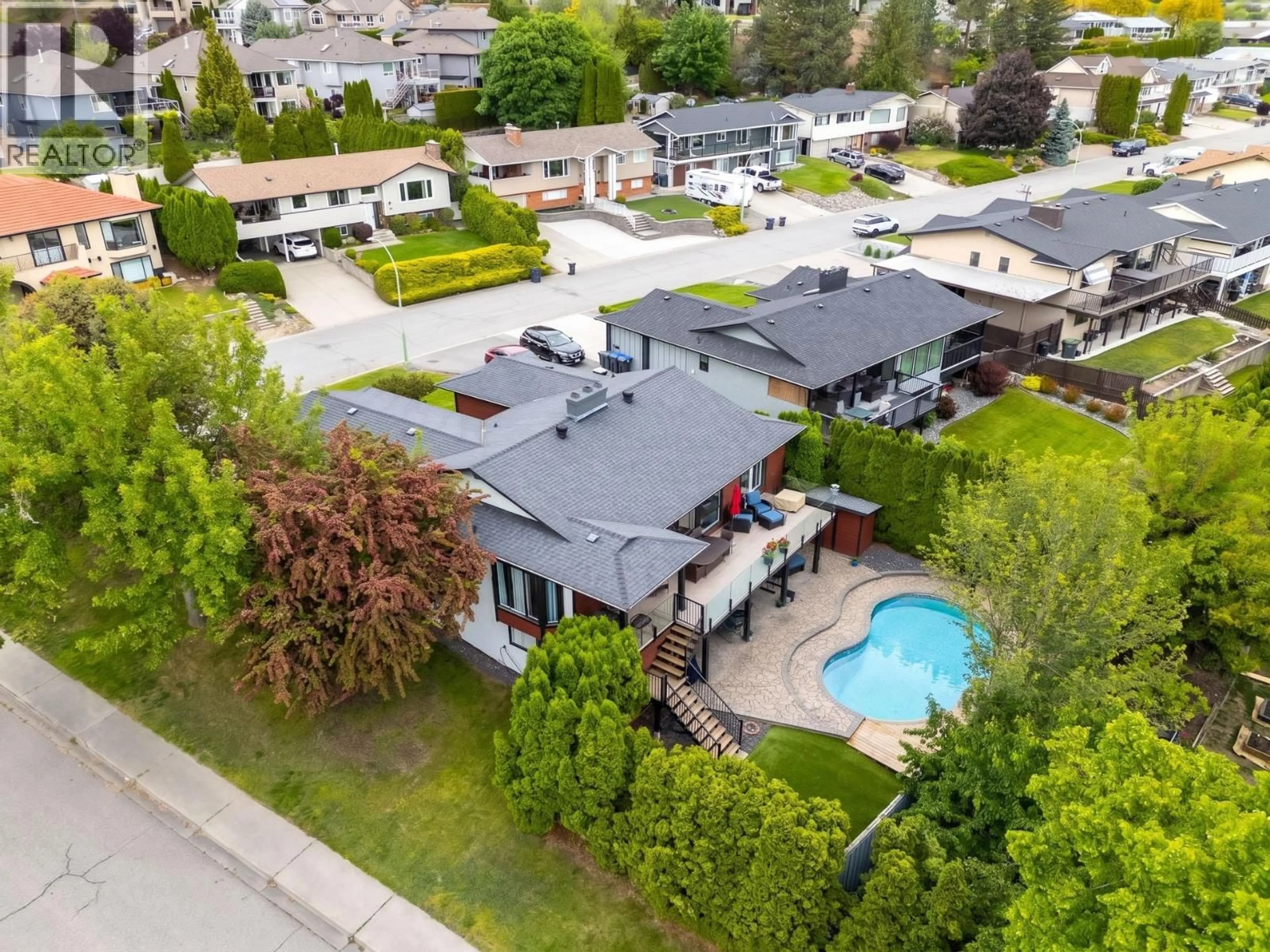 A pic from outside/outdoor area/front of a property/back of a property/a pic from drone, street for 1703 SONORA DRIVE, Kelowna British Columbia V1Y8G2