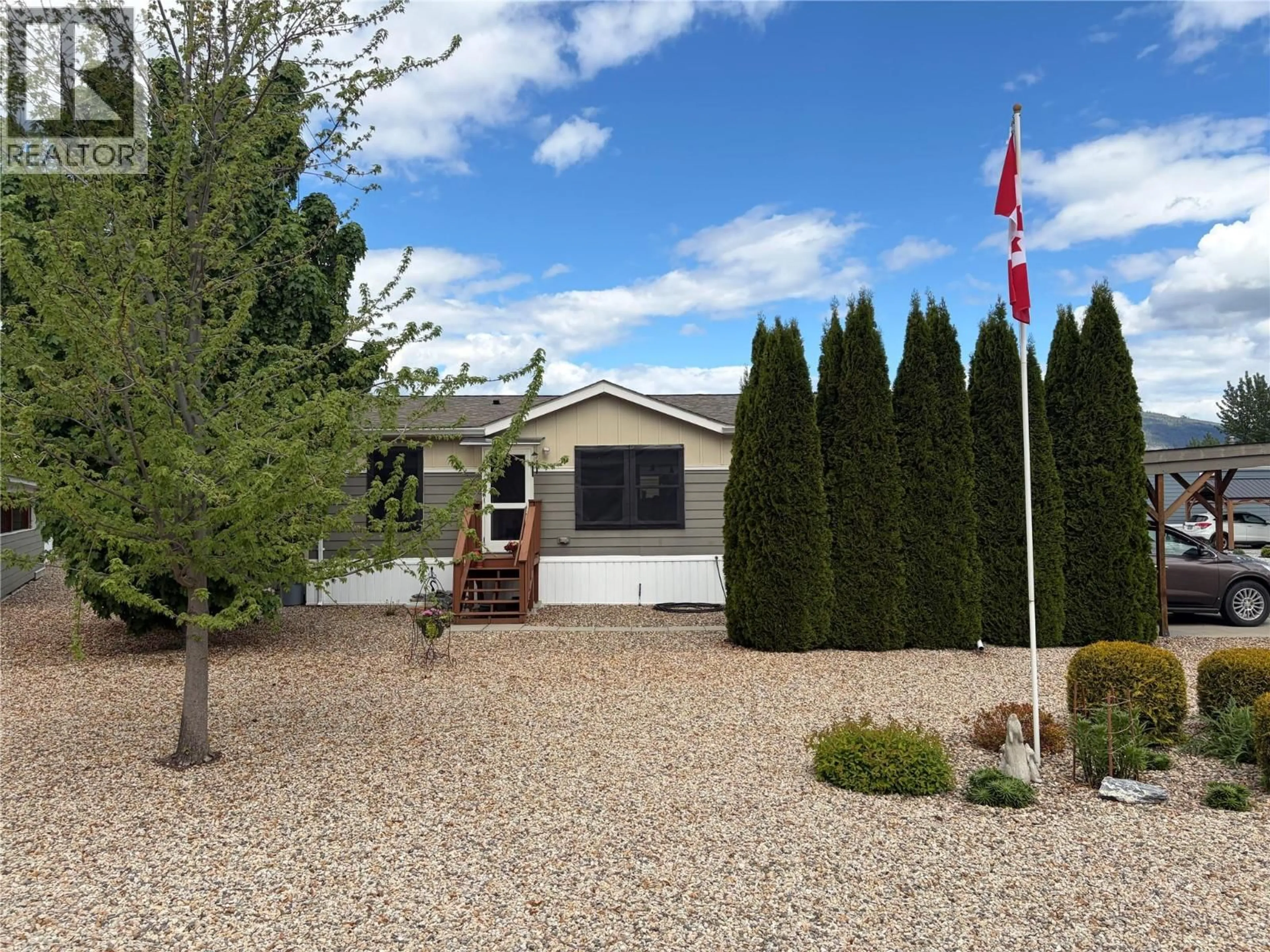 Home with vinyl exterior material, street for 24 - 4811 10A AVENUE NORTHEAST, Salmon Arm British Columbia V1E1C5