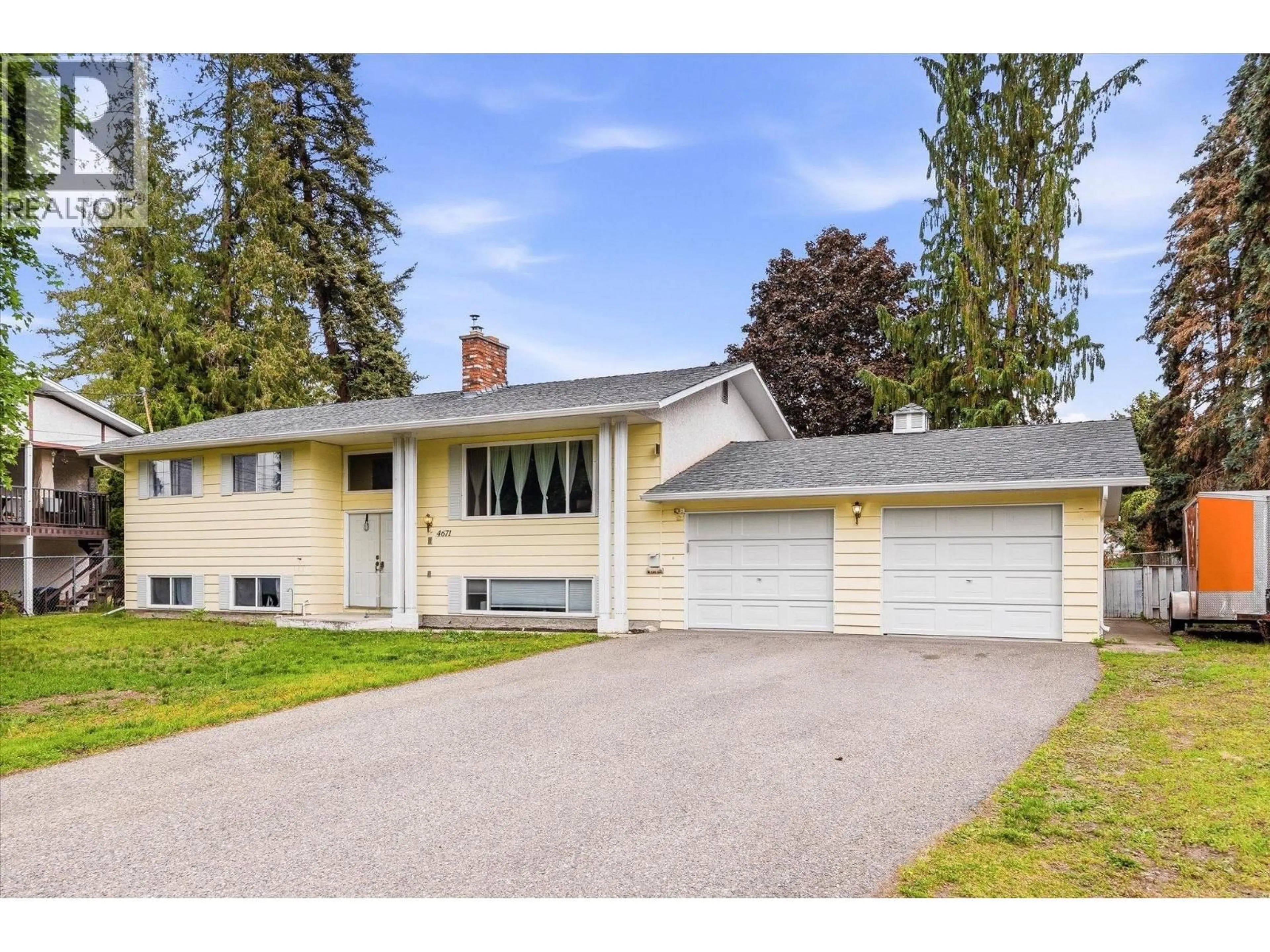 Home with vinyl exterior material, street for 4671 FORDHAM ROAD, Kelowna British Columbia V1W1P1