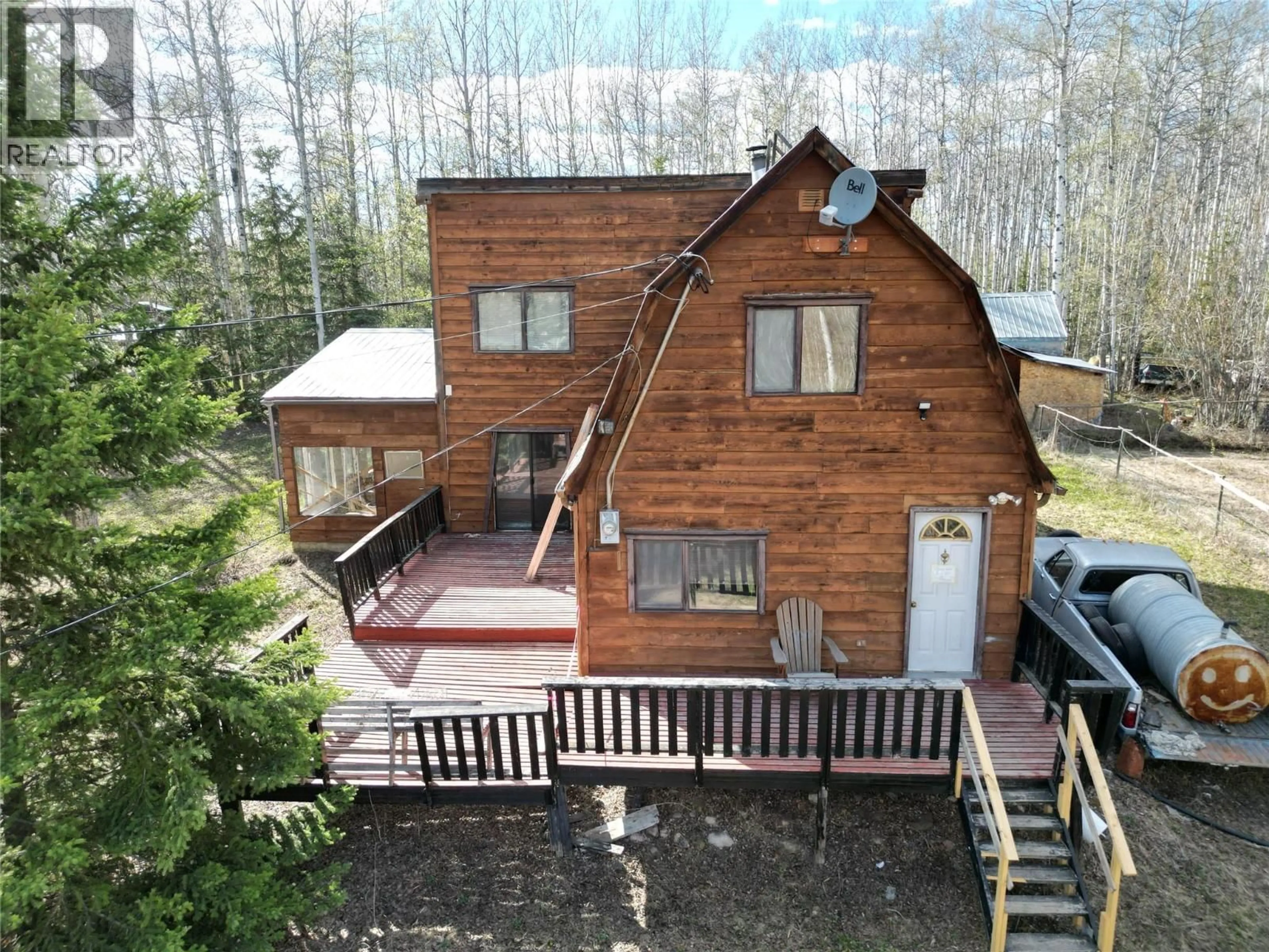 A pic from outside/outdoor area/front of a property/back of a property/a pic from drone, unknown for 404 188 ROAD, Dawson Creek British Columbia V0C2L0