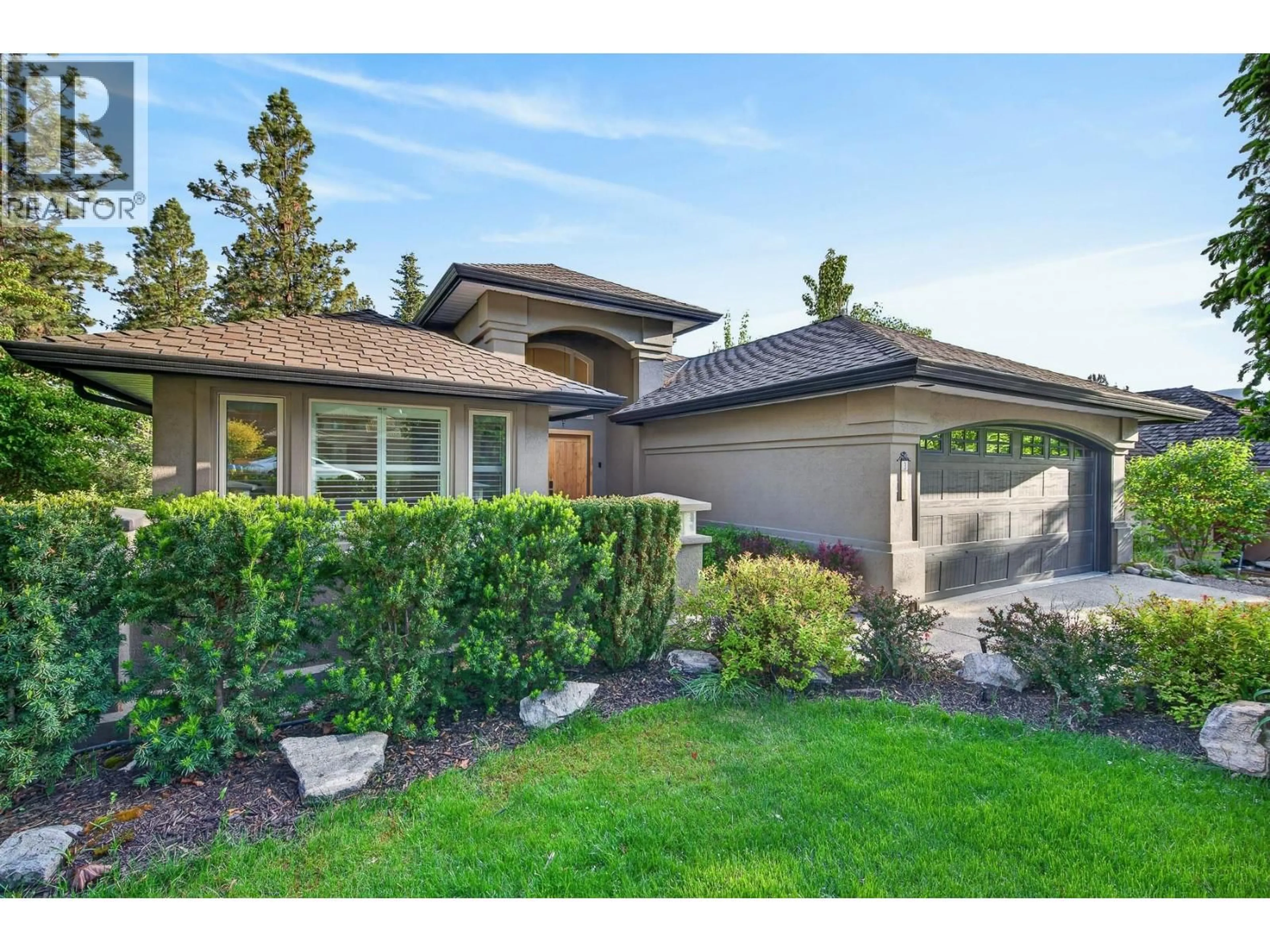 Home with vinyl exterior material, street for 3929 GALLAGHERS CIRCLE, Kelowna British Columbia V1W3Z9