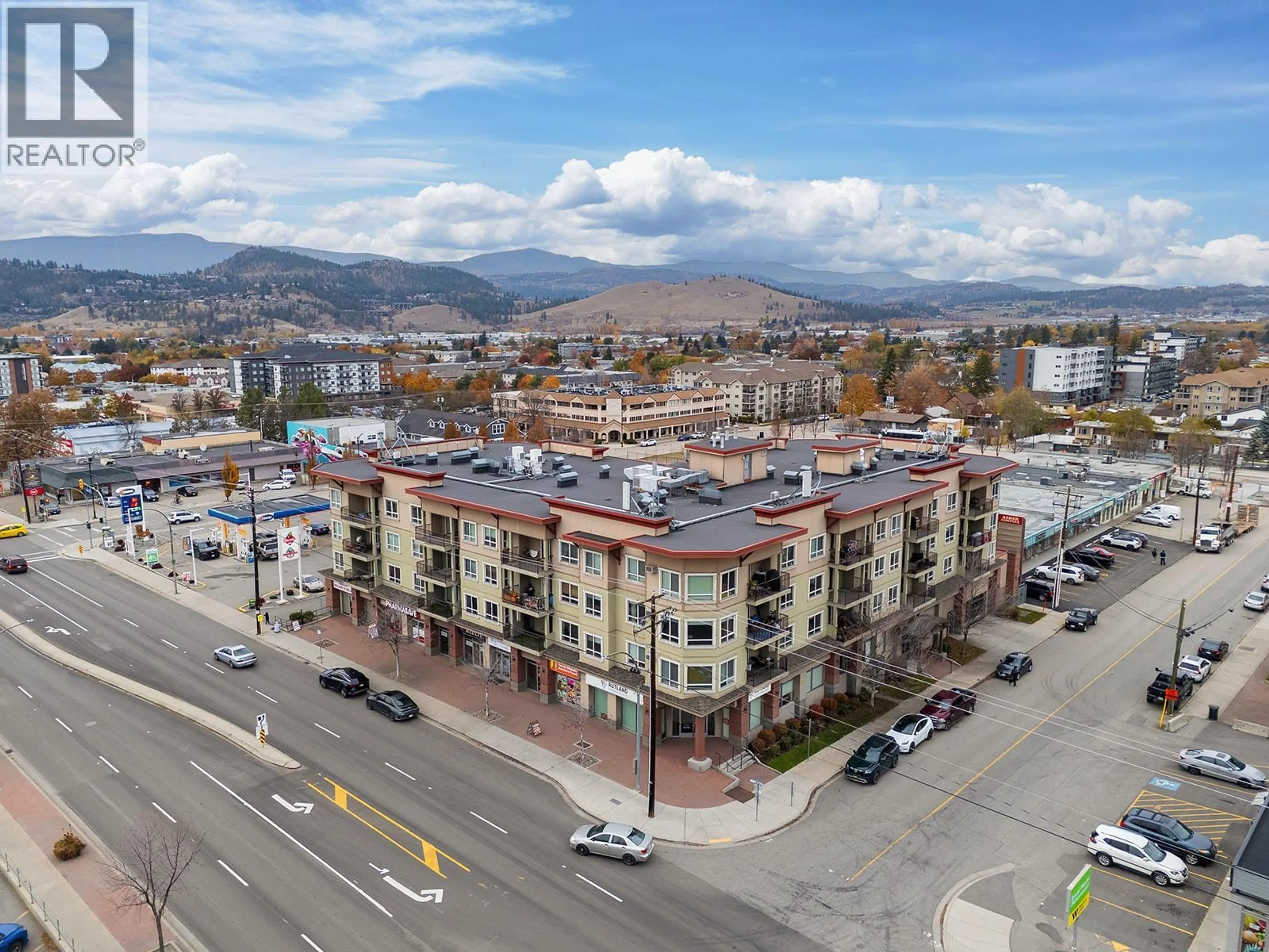A pic from outside/outdoor area/front of a property/back of a property/a pic from drone, mountain view for 412 - 140 ASHER ROAD, Kelowna British Columbia V1X3H6