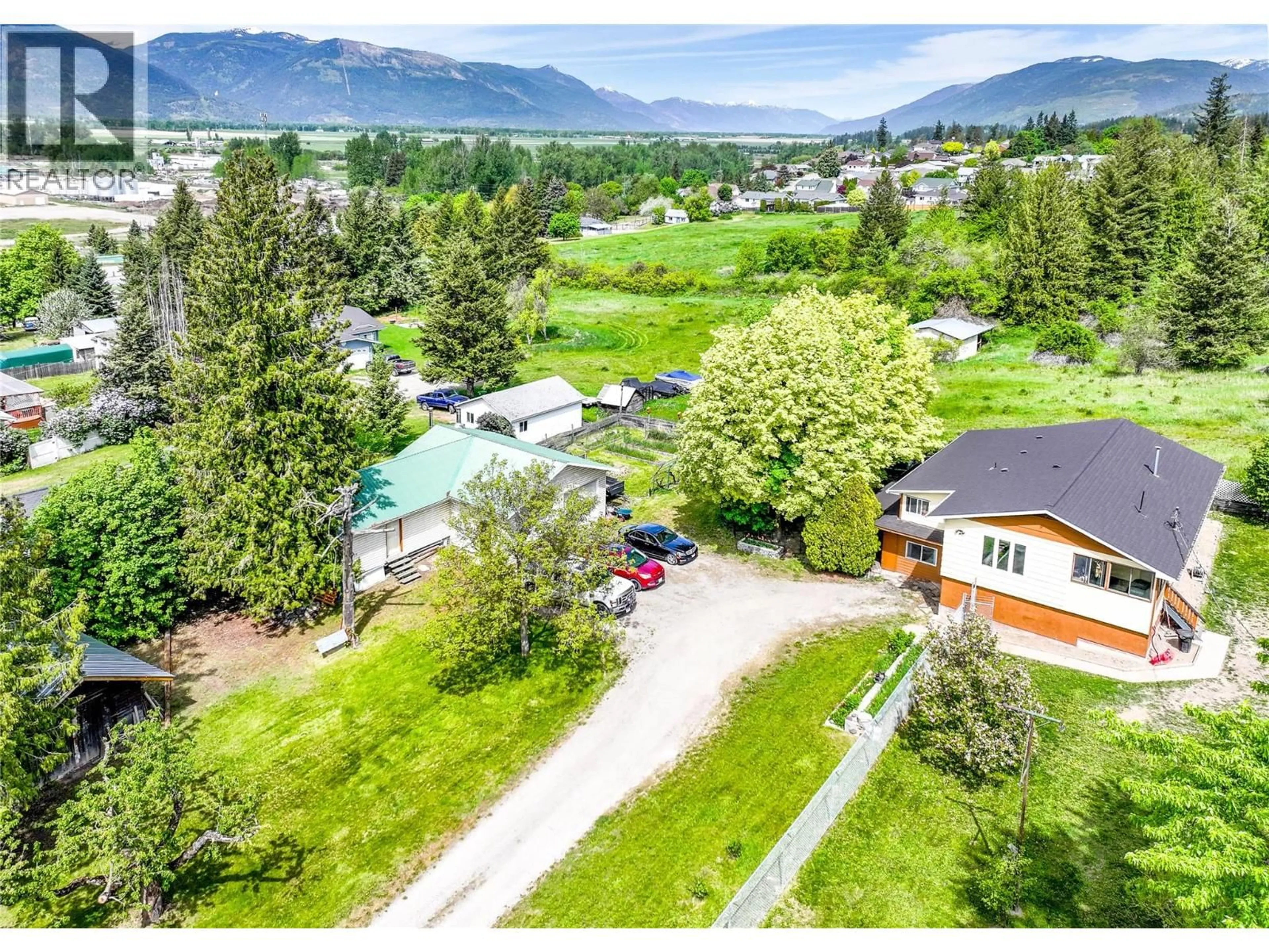 A pic from outside/outdoor area/front of a property/back of a property/a pic from drone, mountain view for 510 ERICKSON ROAD, Creston British Columbia V0B1G3