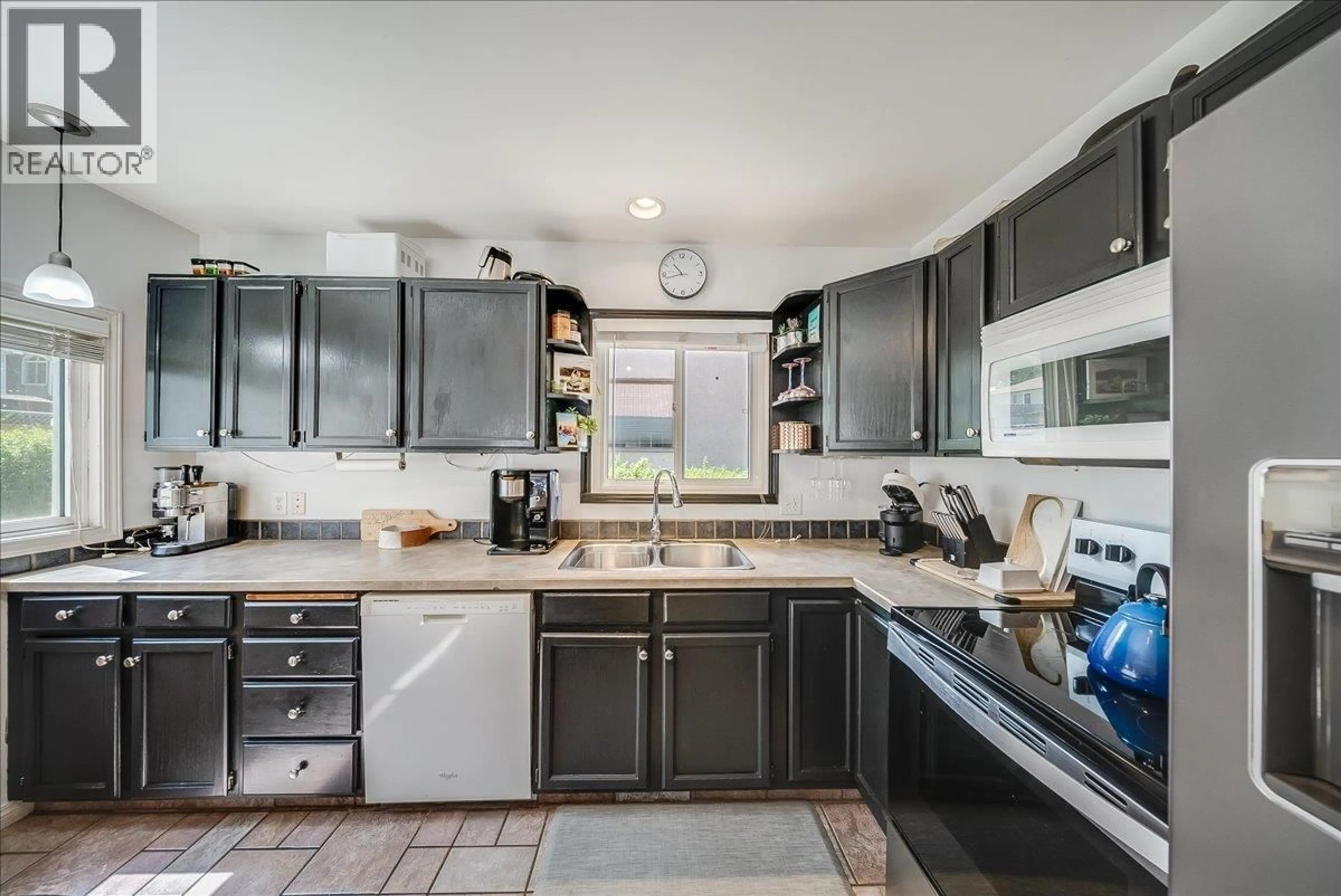 Open concept kitchen, ceramic/tile floor for 128 HAIG STREET, Warfield British Columbia V1R2L9