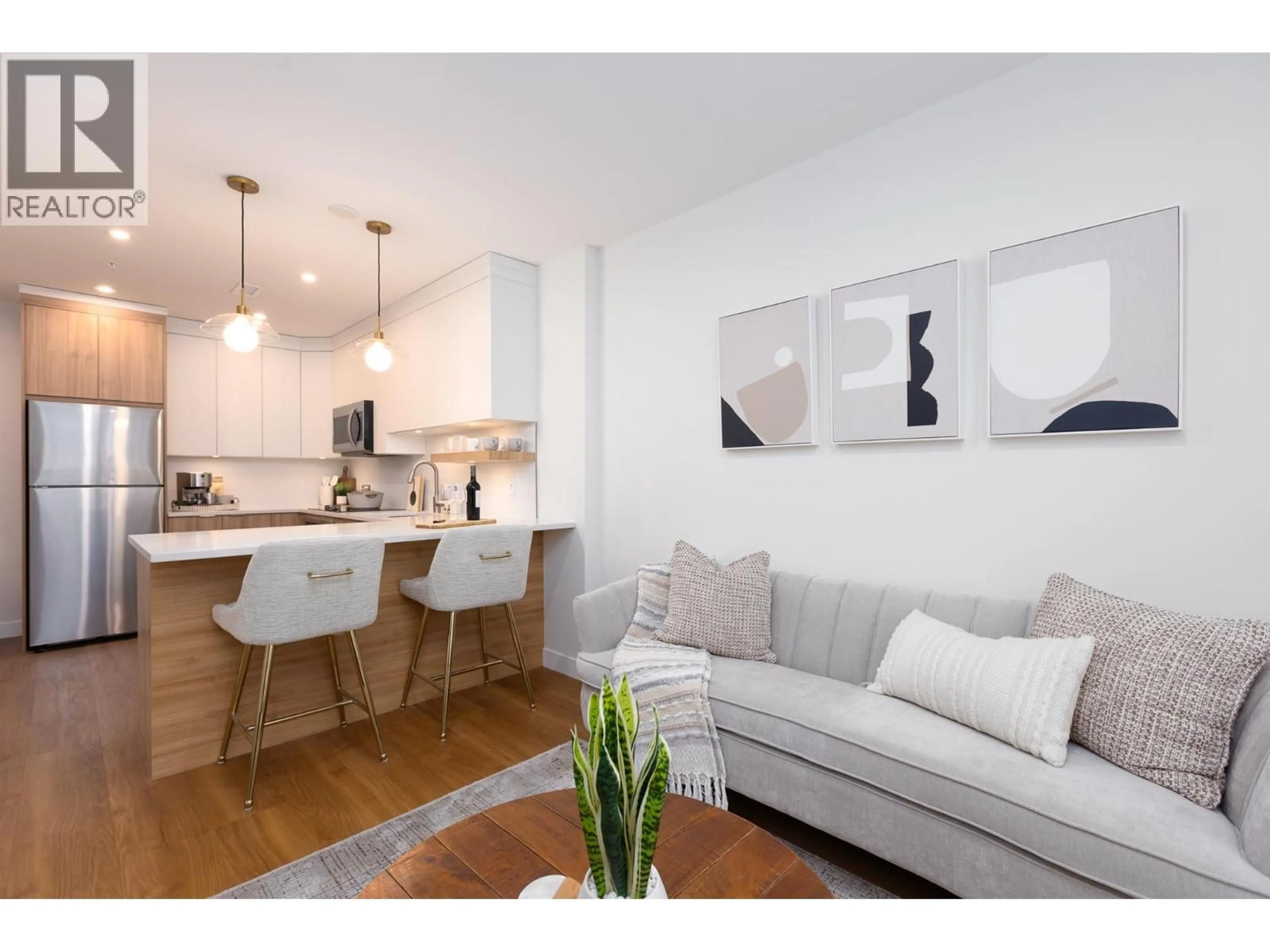 Open concept kitchen, wood/laminate floor for 424 - 1281 PRIDHAM AVENUE, Kelowna British Columbia V1Y6B3