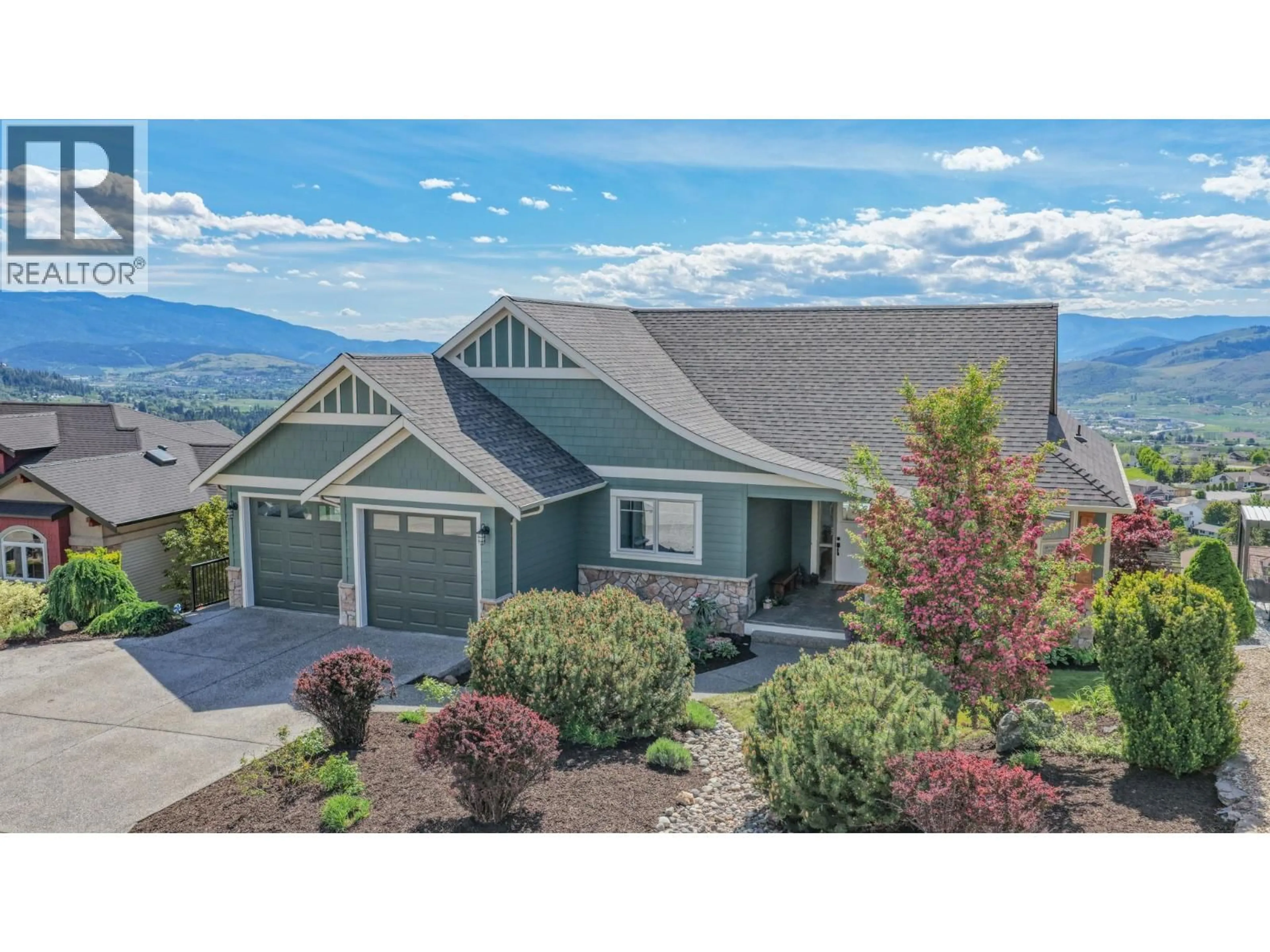 Home with vinyl exterior material, mountain view for 1437 COPPER MOUNTAIN COURT, Vernon British Columbia V1B3Y7
