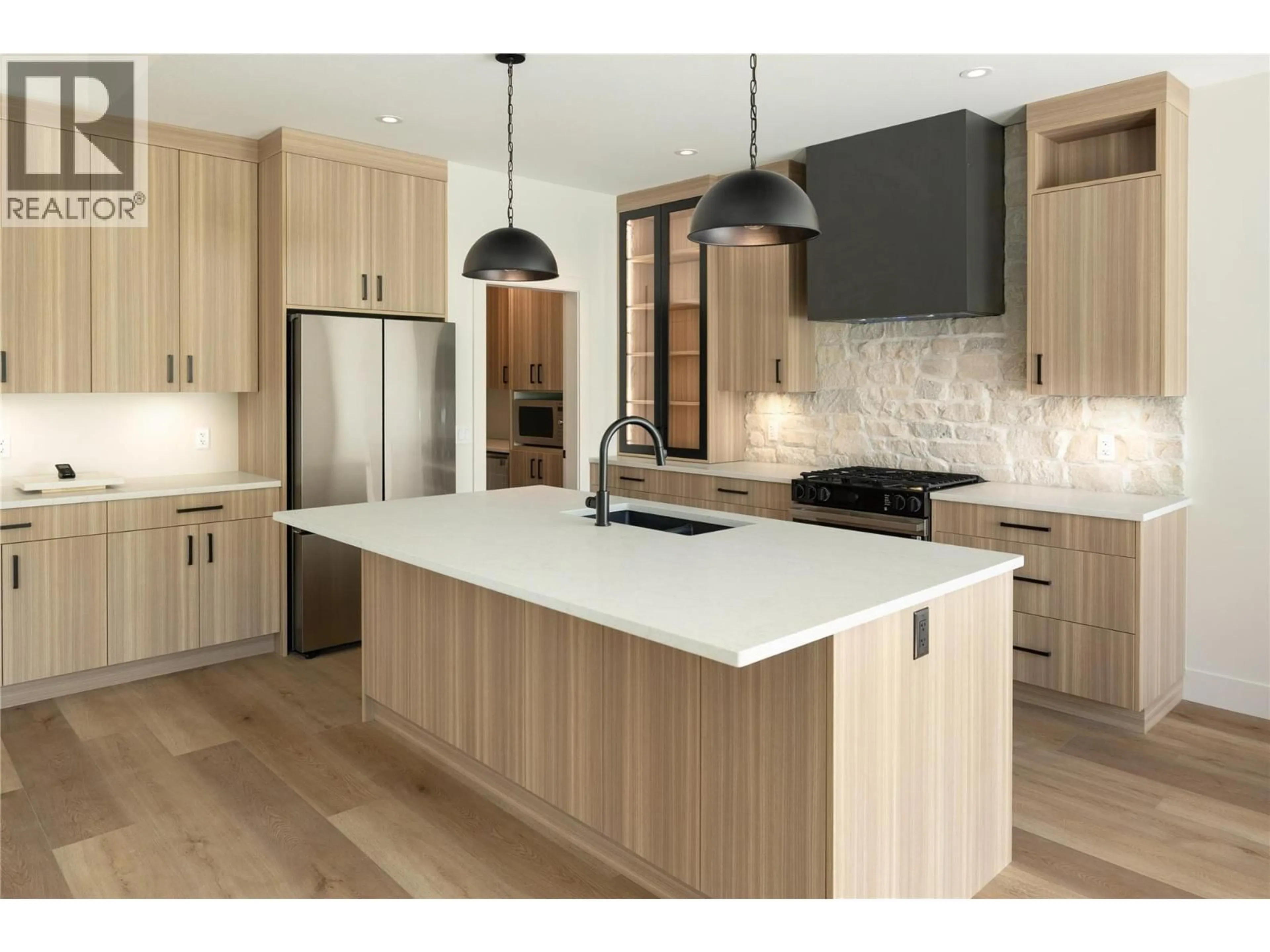 Contemporary kitchen, wood/laminate floor for 2125 MONTENEGRO DRIVE, Kelowna British Columbia V1P0B2