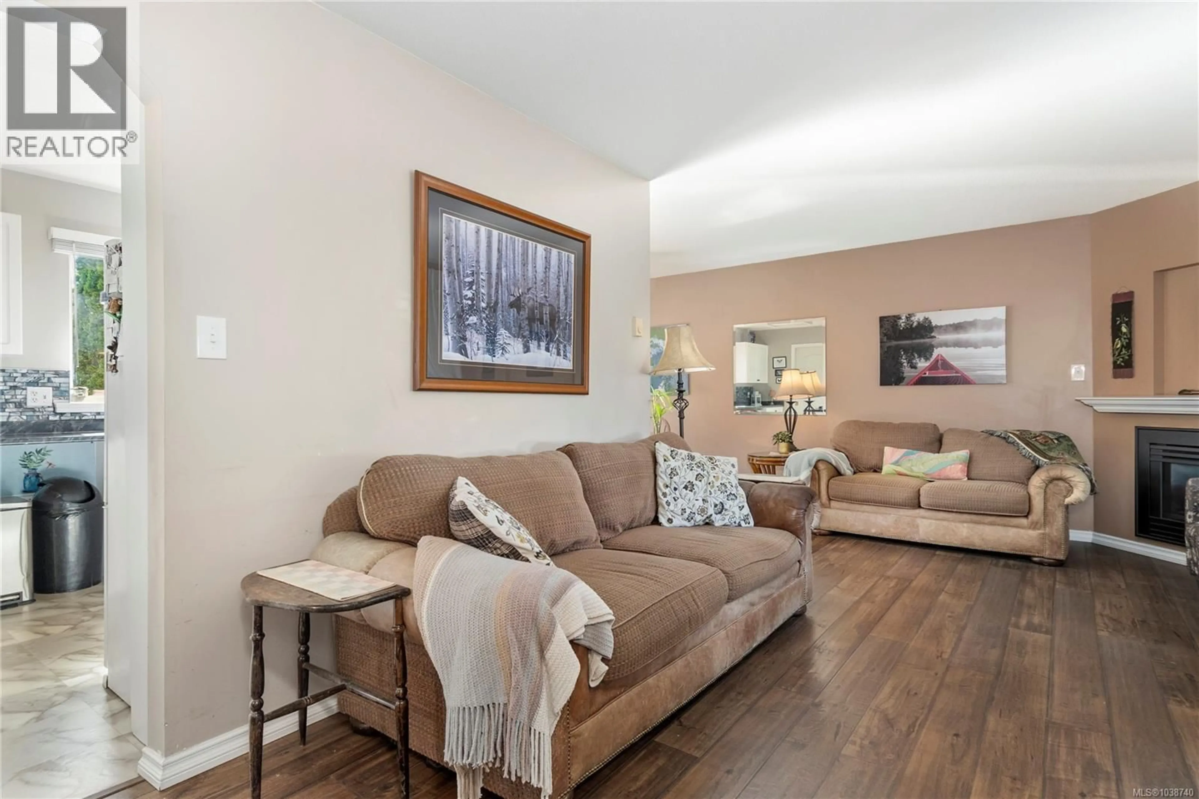 Living room with furniture, wood/laminate floor for 2505 SODERHOLM COURT, Campbell River British Columbia V9W8E3
