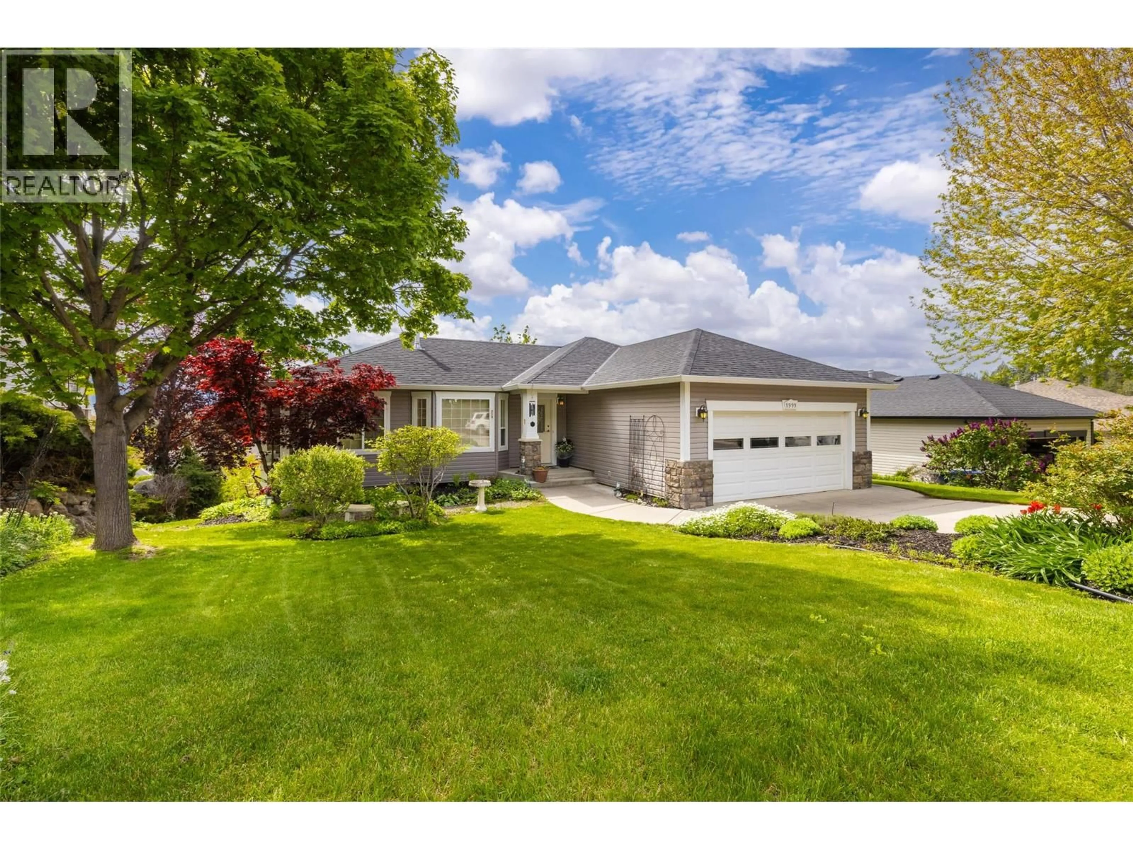 Home with vinyl exterior material, street for 1999 ROSEALEE LANE, West Kelowna British Columbia V1Z3Z6