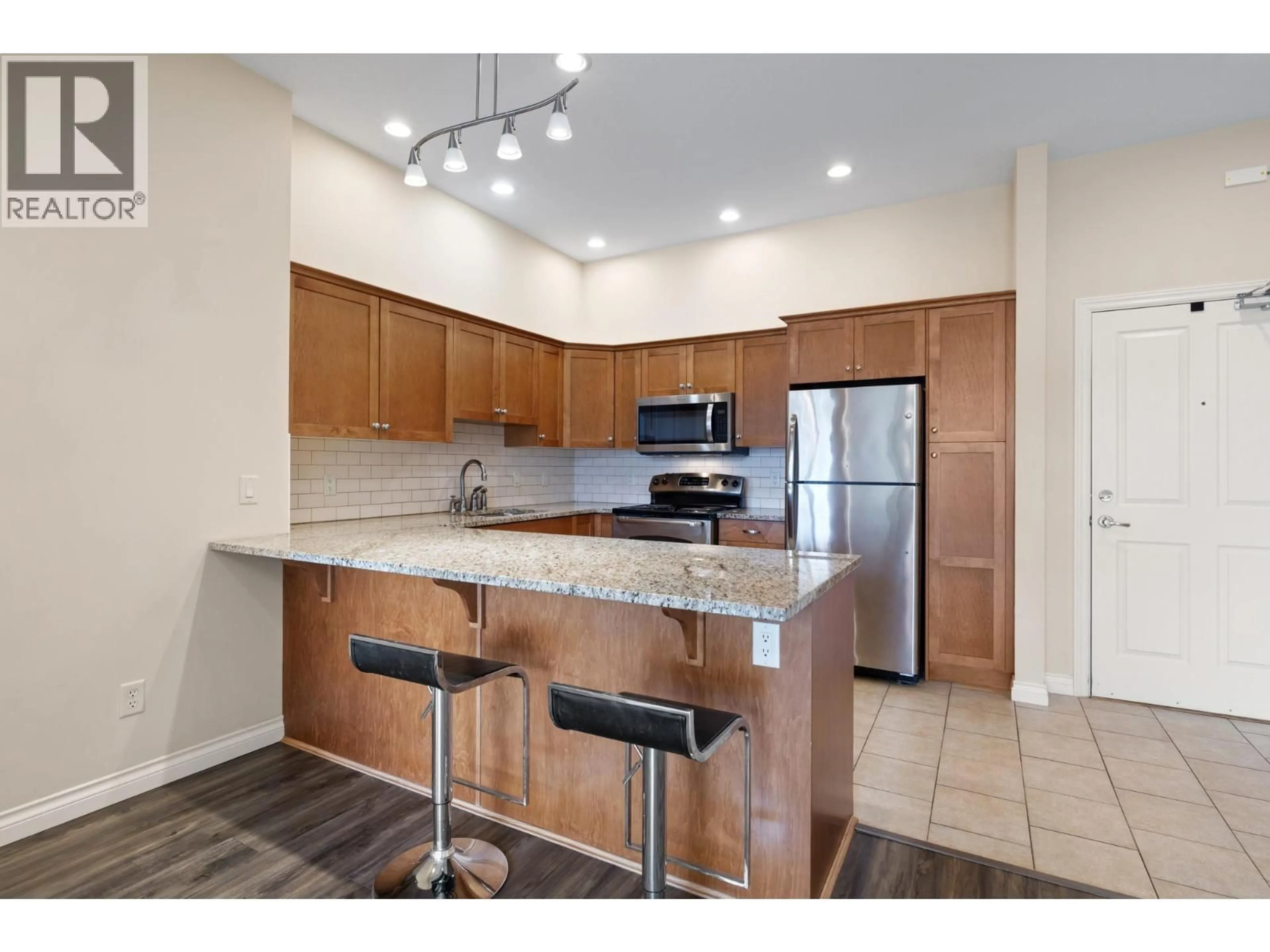 Open concept kitchen, ceramic/tile floor for 3406 - 3832 OLD OKANAGAN HIGHWAY, West Kelowna British Columbia V4T3G6