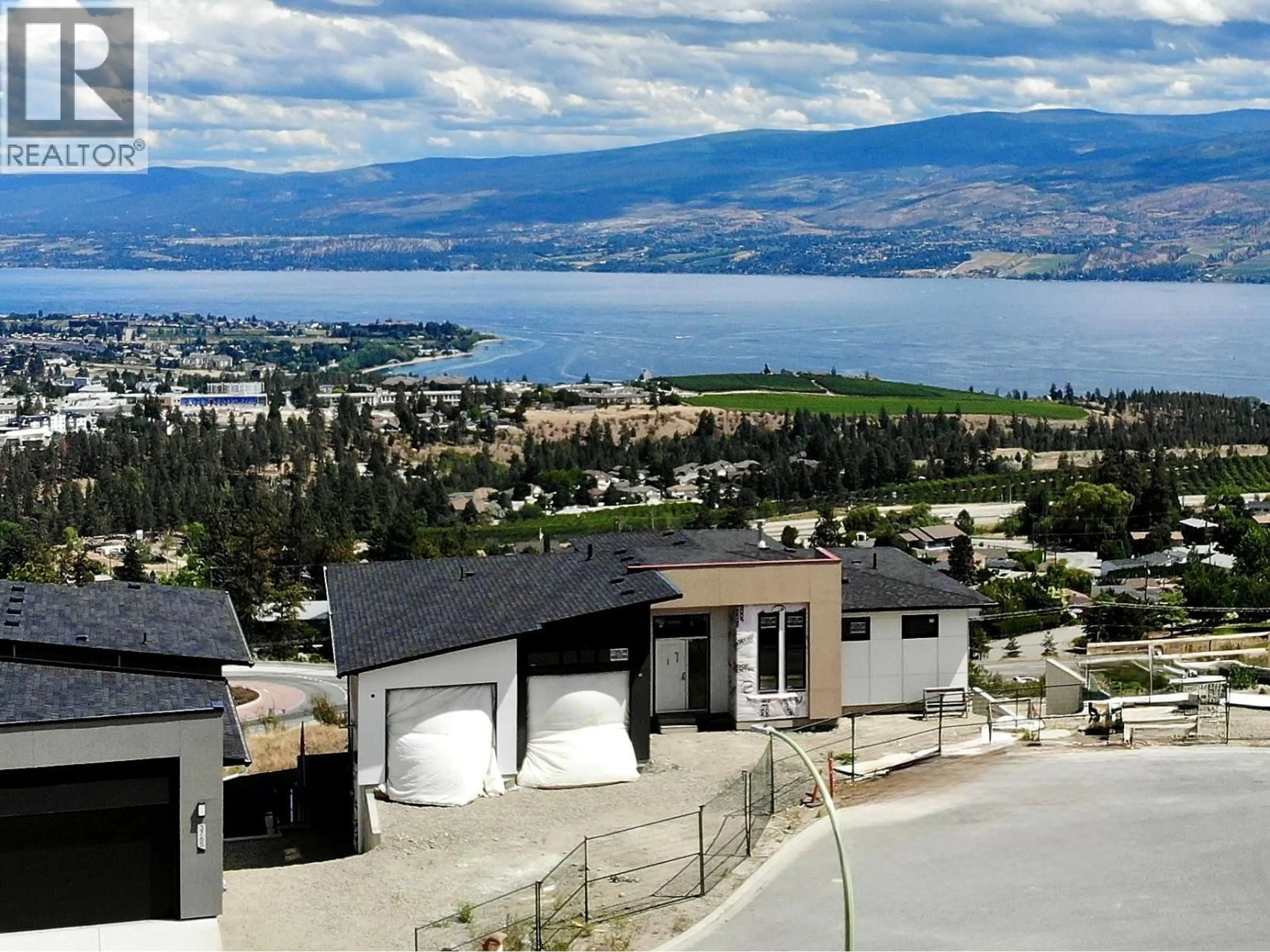 A pic from outside/outdoor area/front of a property/back of a property/a pic from drone, mountain view for 3769 DAVIDSON COURT, West Kelowna British Columbia V4T0B1