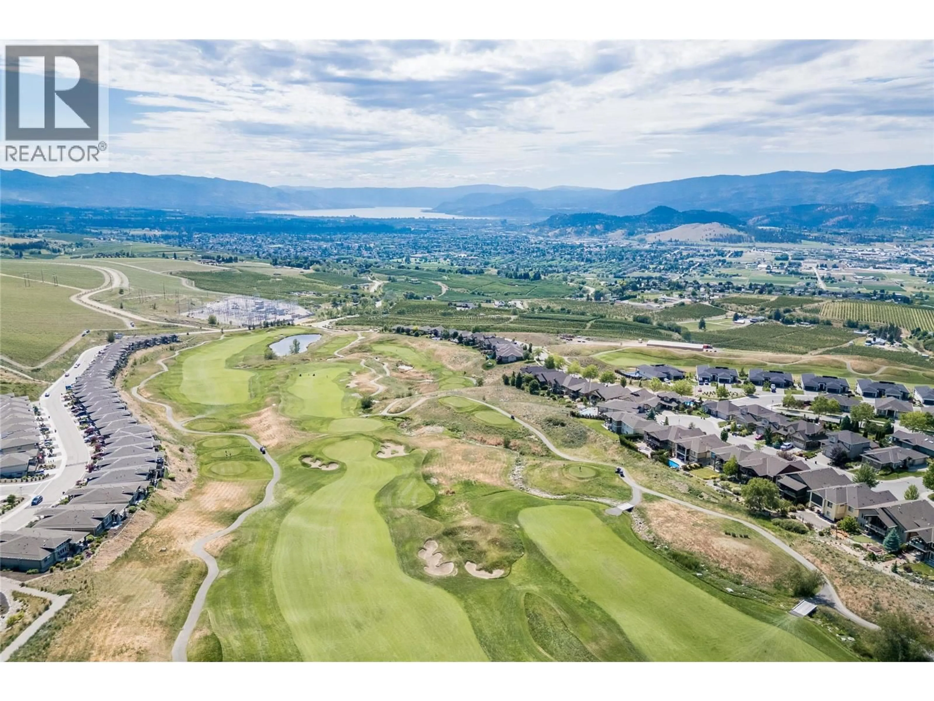 A pic from outside/outdoor area/front of a property/back of a property/a pic from drone, water/lake/river/ocean view for 1601 TOWER RANCH BOULEVARD, Kelowna British Columbia V1P1P9