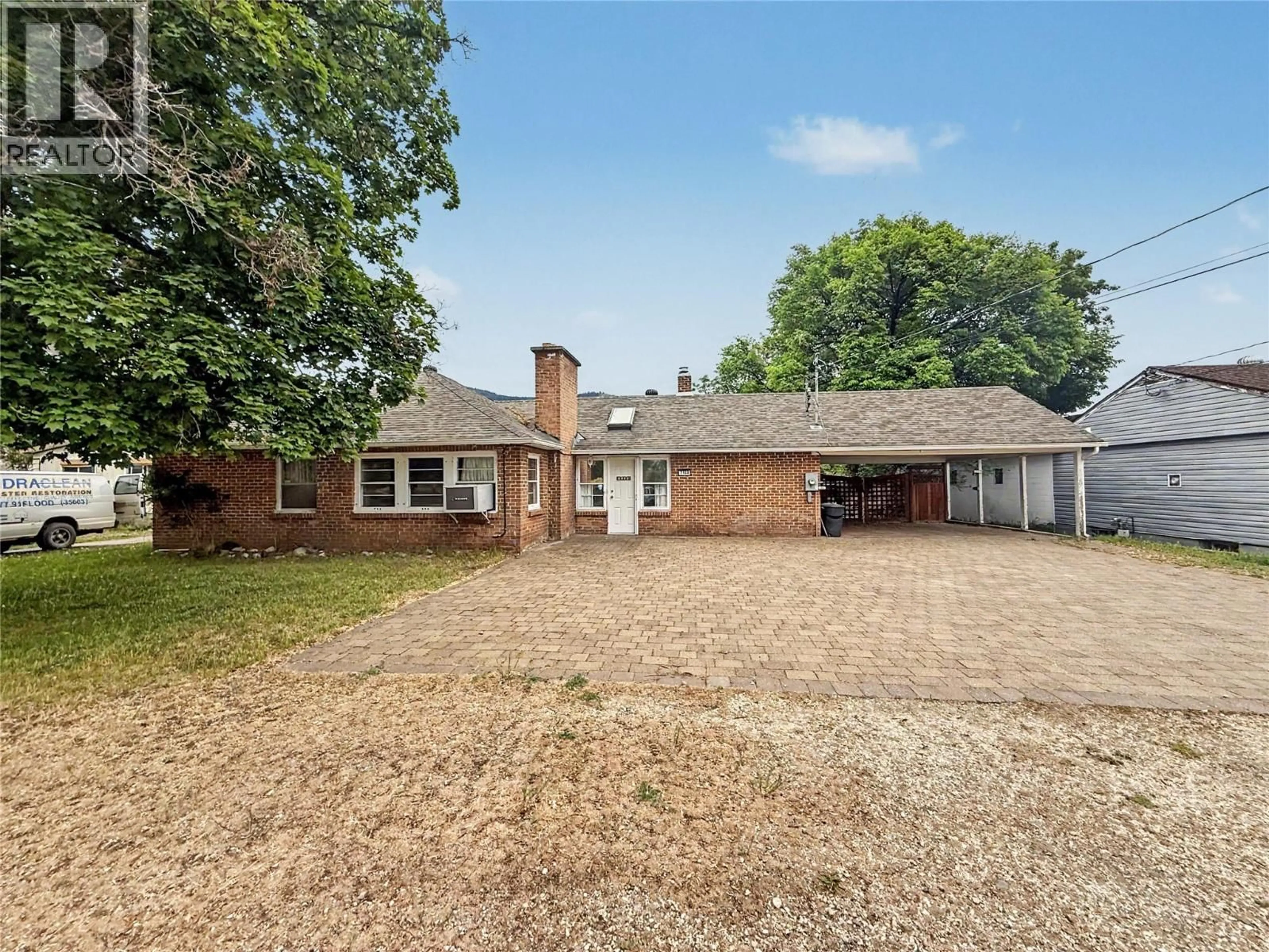 A pic from outside/outdoor area/front of a property/back of a property/a pic from drone, street for 7324 10TH STREET, Grand Forks British Columbia V0H1H0