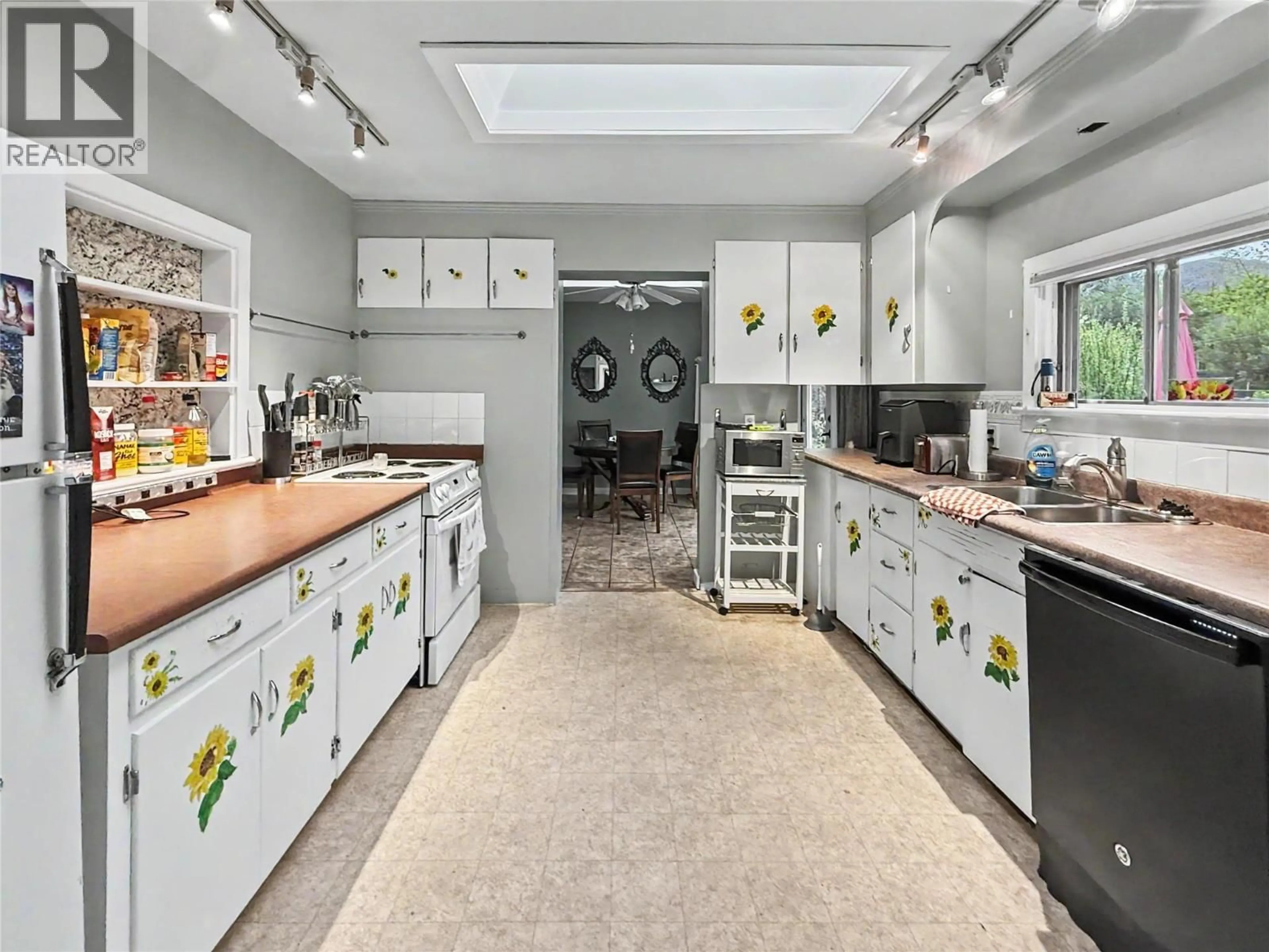 Kitchen with laundary machines, unknown for 7324 10TH STREET, Grand Forks British Columbia V0H1H0