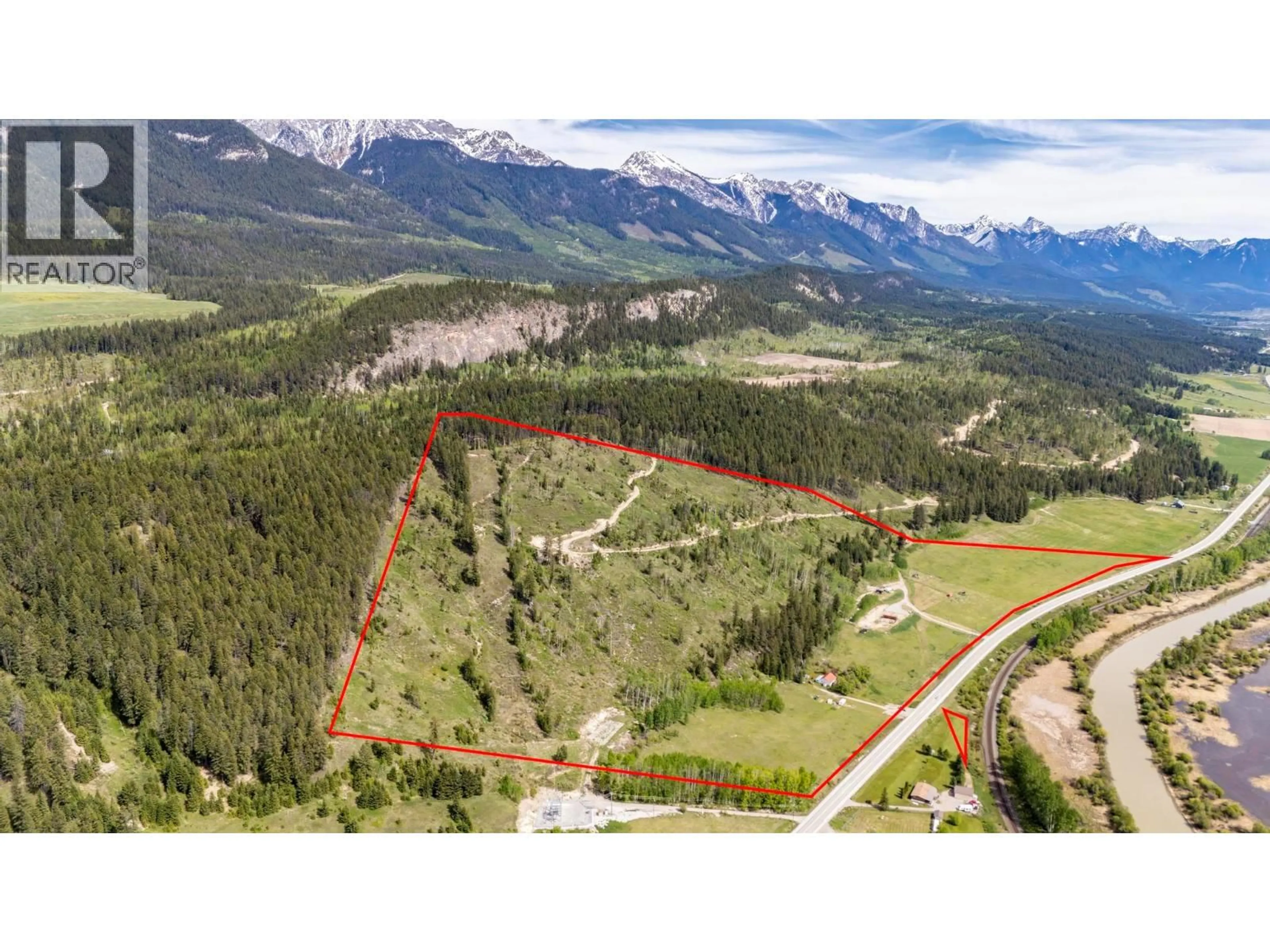 A pic from outside/outdoor area/front of a property/back of a property/a pic from drone, mountain view for 3657 95 HIGHWAY, Parson British Columbia V0A1H4