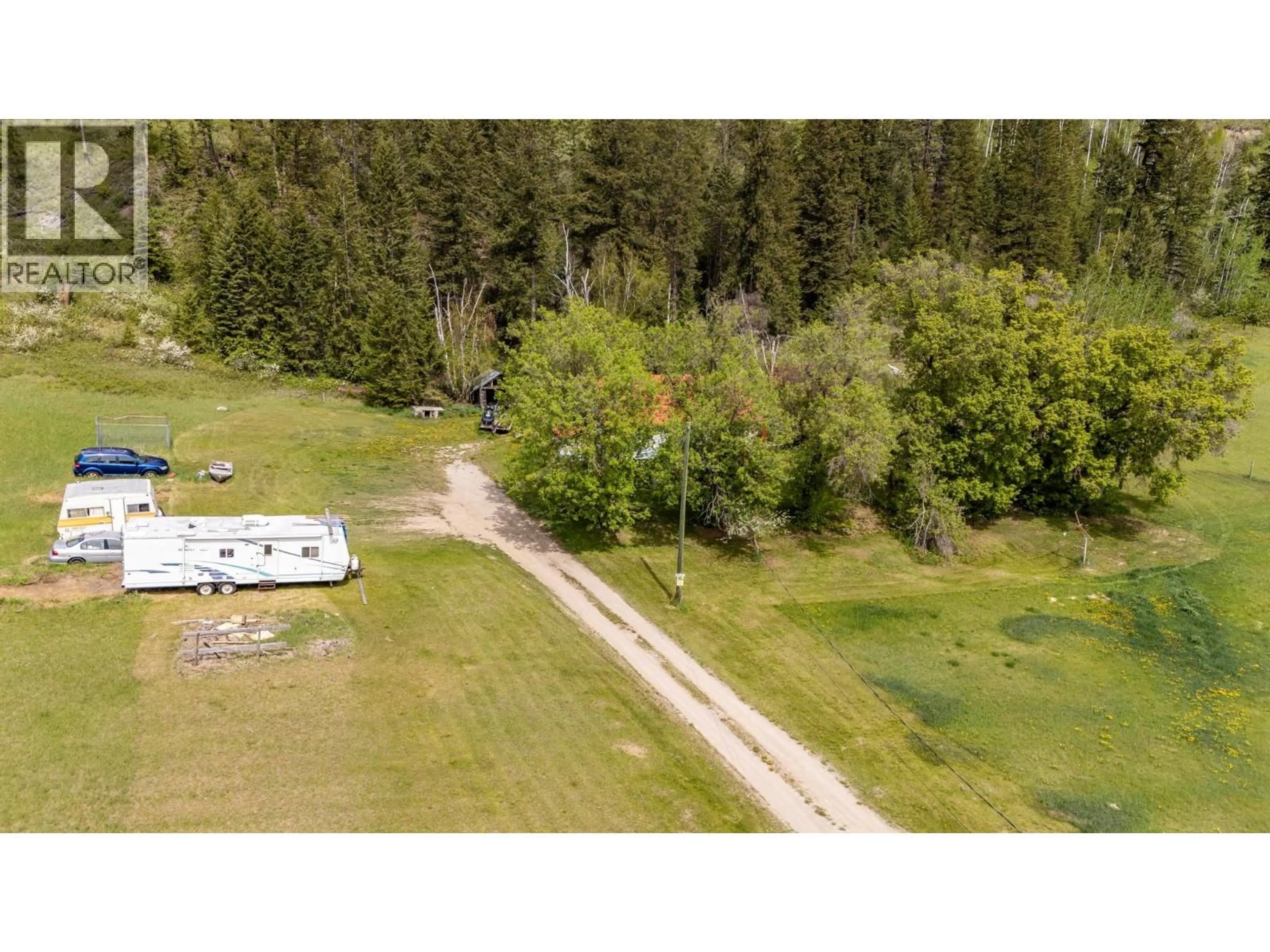 A pic from outside/outdoor area/front of a property/back of a property/a pic from drone, forest/trees view for 3657 95 HIGHWAY, Parson British Columbia V0A1H4
