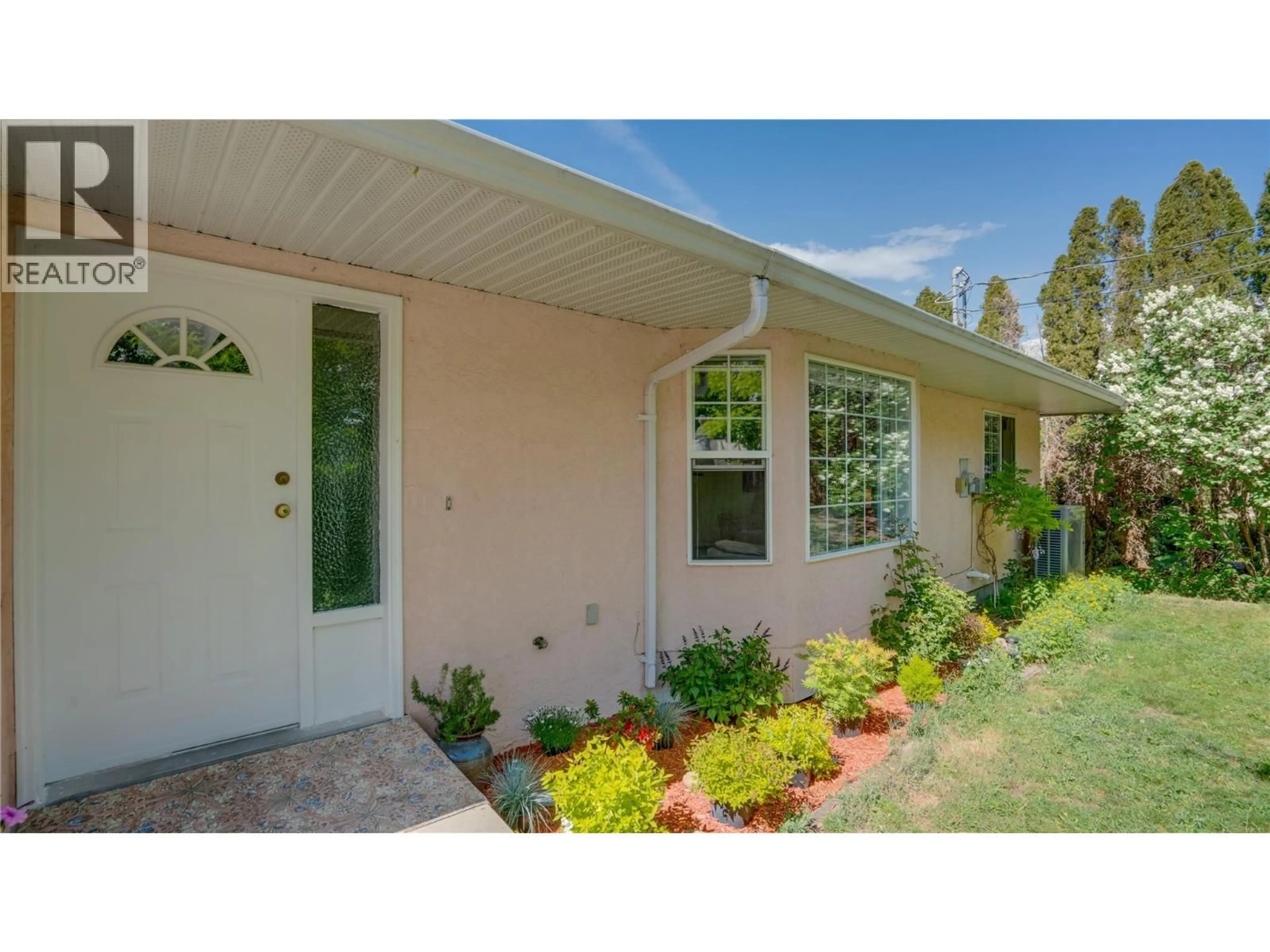 Home with vinyl exterior material, street for 6547 APOLLO ROAD, Vernon British Columbia V1H1J2