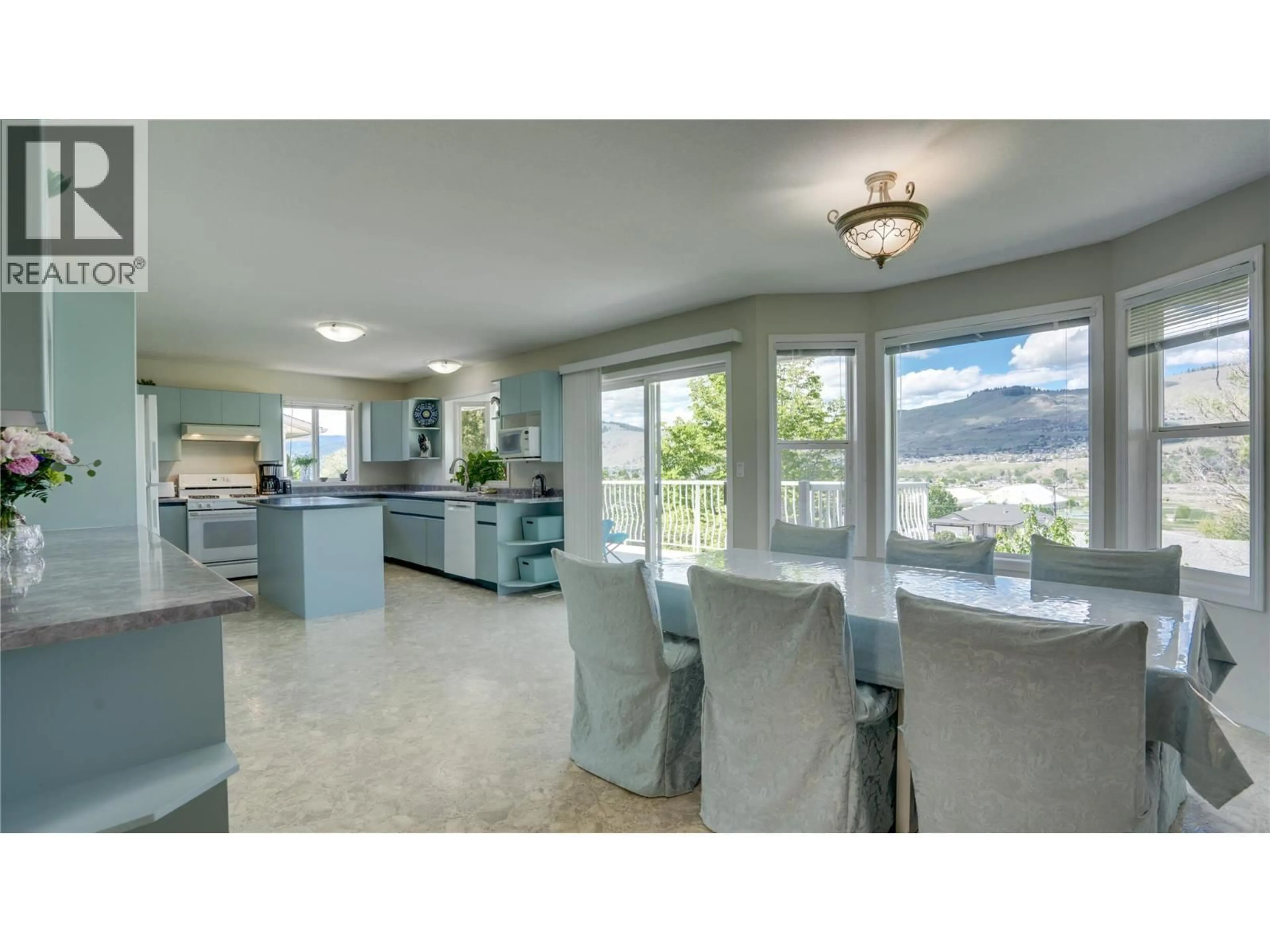 Open concept kitchen, ceramic/tile floor for 6547 APOLLO ROAD, Vernon British Columbia V1H1J2