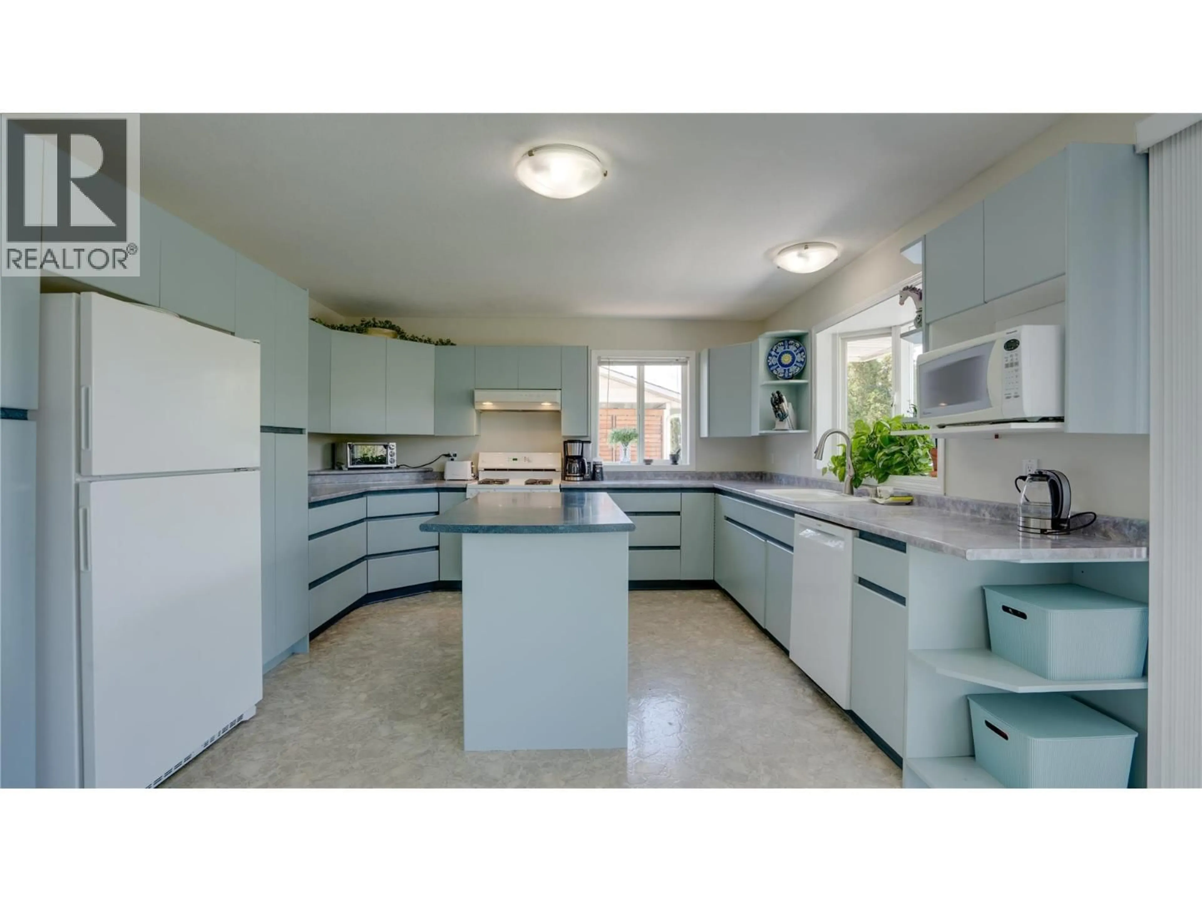 Standard kitchen, ceramic/tile floor for 6547 APOLLO ROAD, Vernon British Columbia V1H1J2