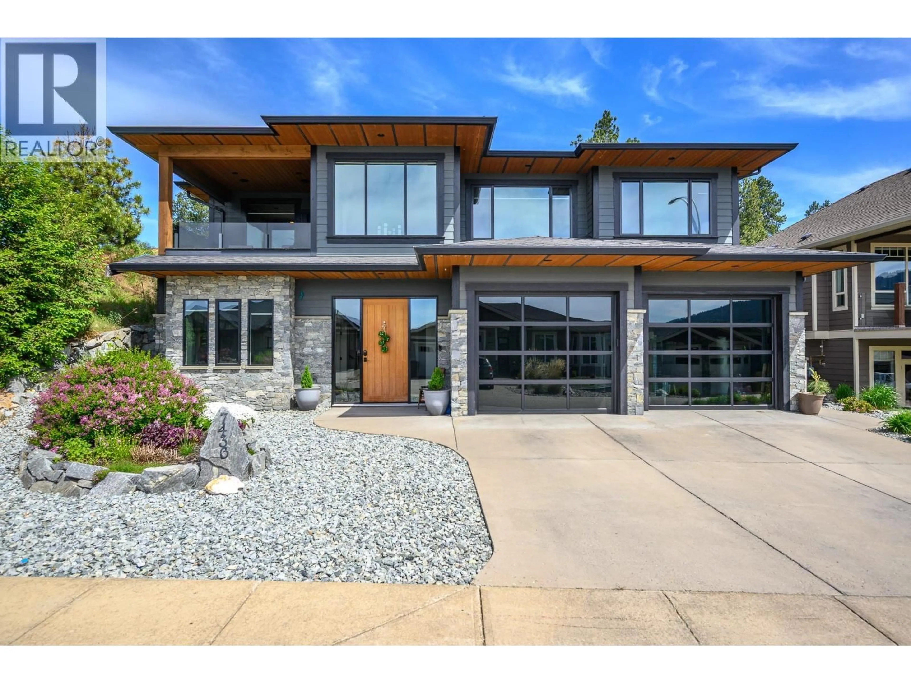 Home with brick exterior material, street for 7436 SUN PEAKS DRIVE, Vernon British Columbia V1B4C7