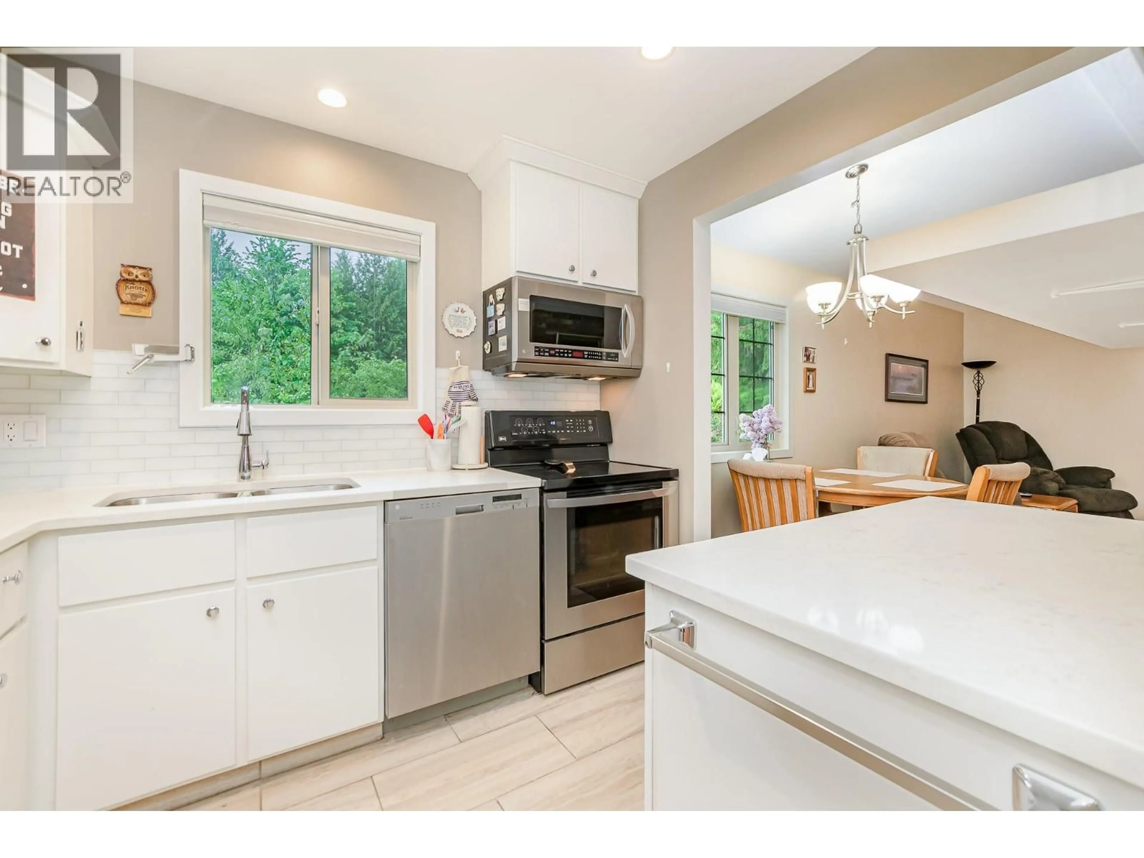 Open concept kitchen, ceramic/tile floor for 1226 GREEN ROAD SOUTH, Sicamous British Columbia V0E2V1
