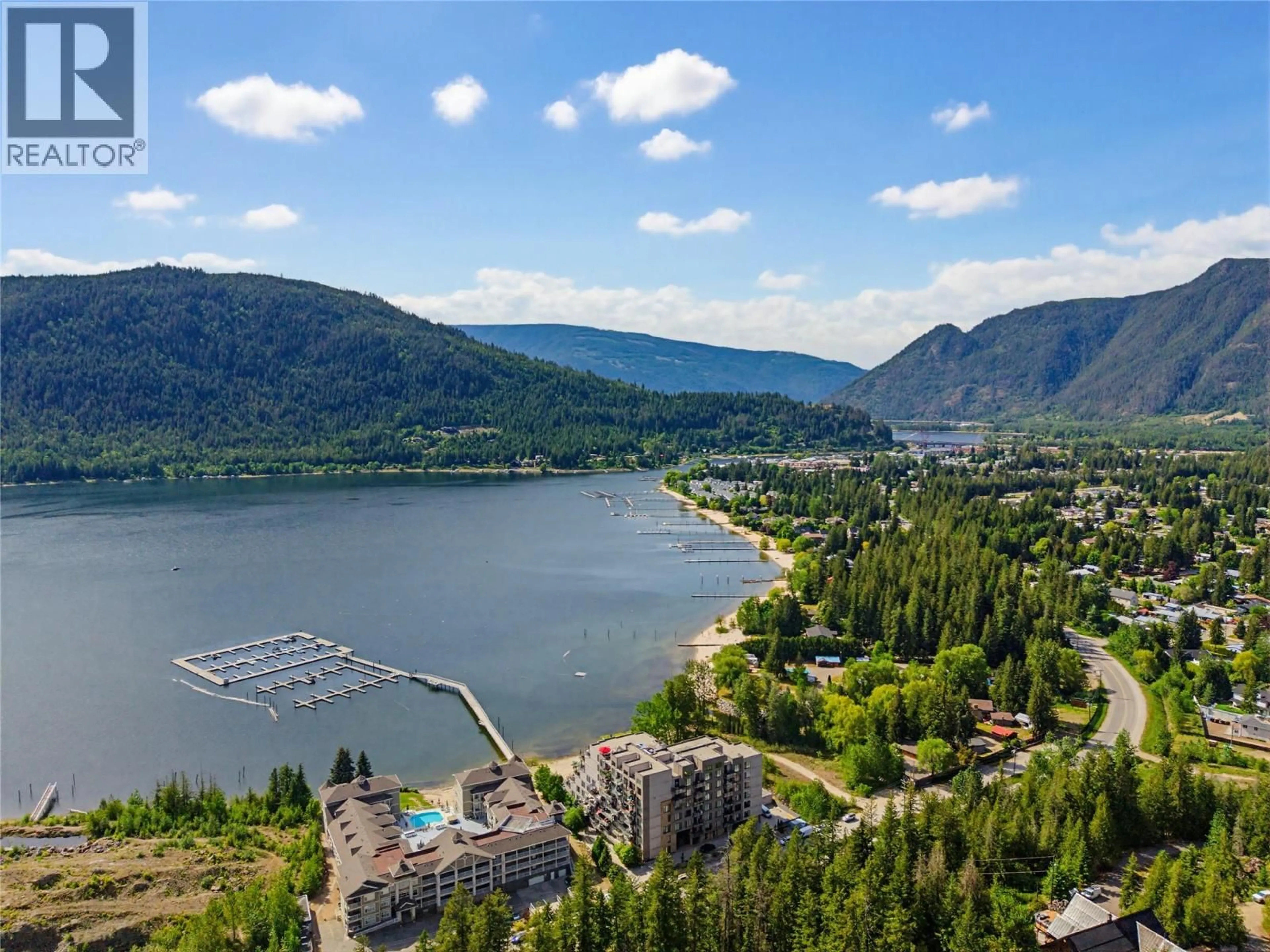 A pic from outside/outdoor area/front of a property/back of a property/a pic from drone, water/lake/river/ocean view for 404 - 326 MARA LAKE LANE, Sicamous British Columbia V0E2V1