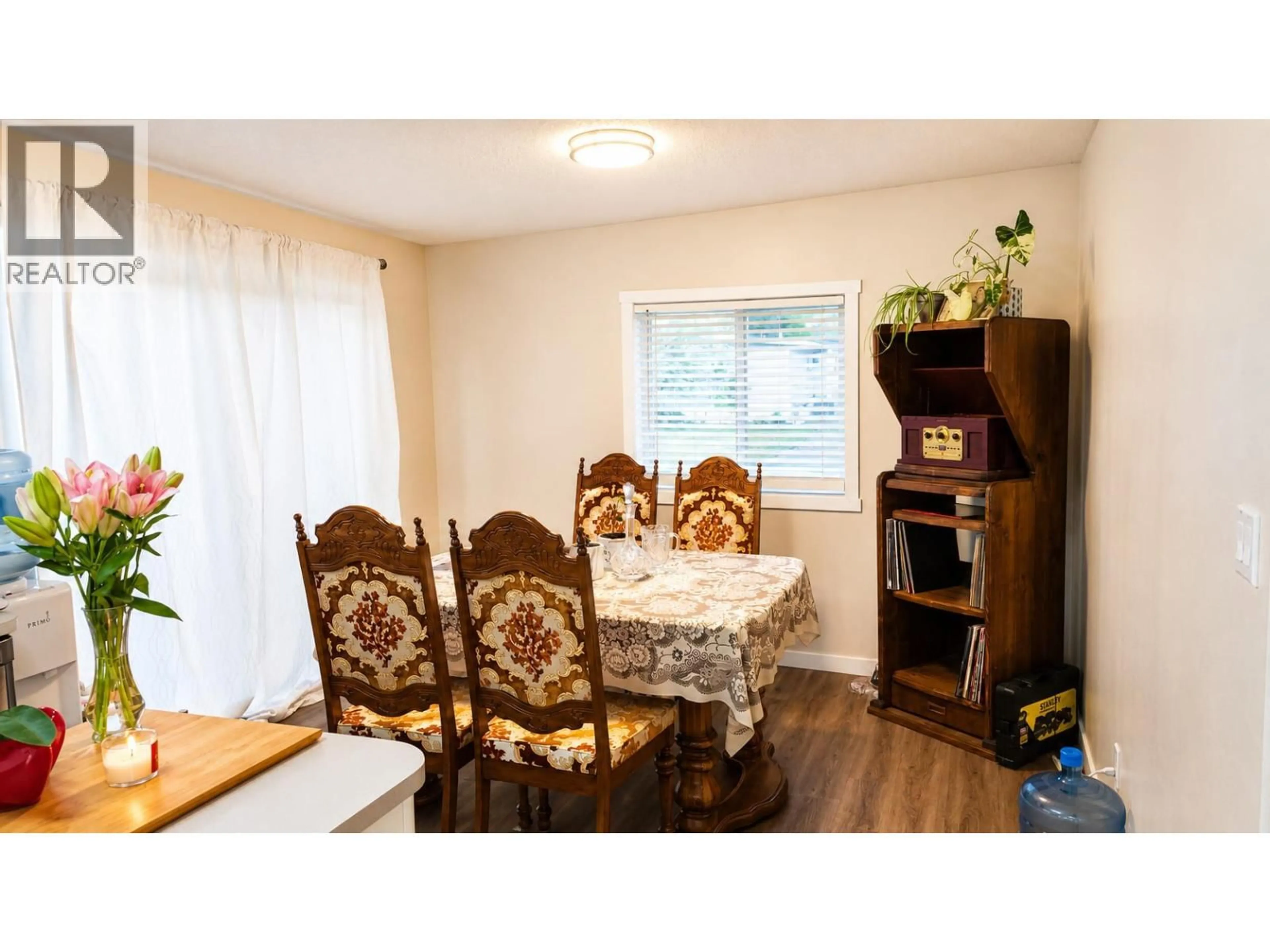 Dining room, wood/laminate floor for 79 - 9020 JIM BAILEY ROAD, Kelowna British Columbia V4V1E5