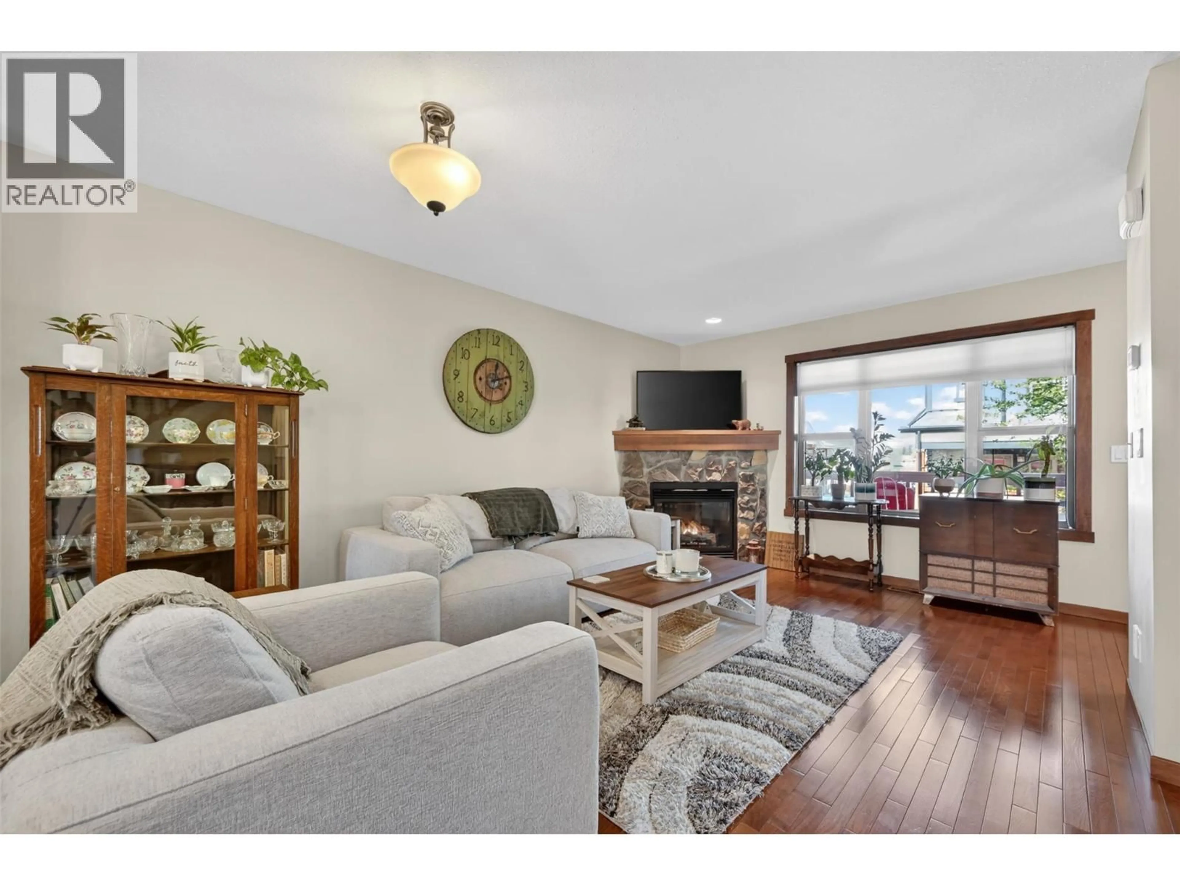 Living room with furniture, wood/laminate floor for 23 - 1000 9TH STREET, Invermere British Columbia V0A1K4